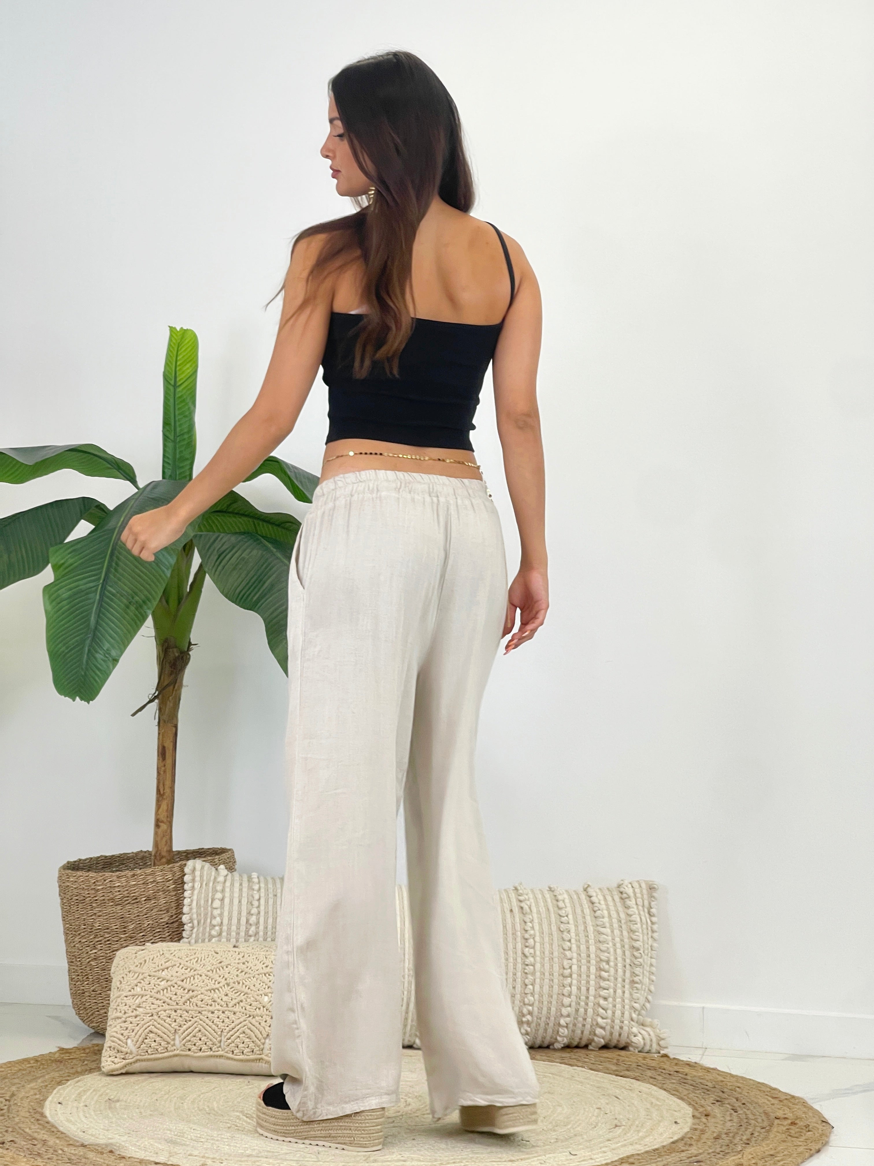 Top asimmetrico con spalline a coste