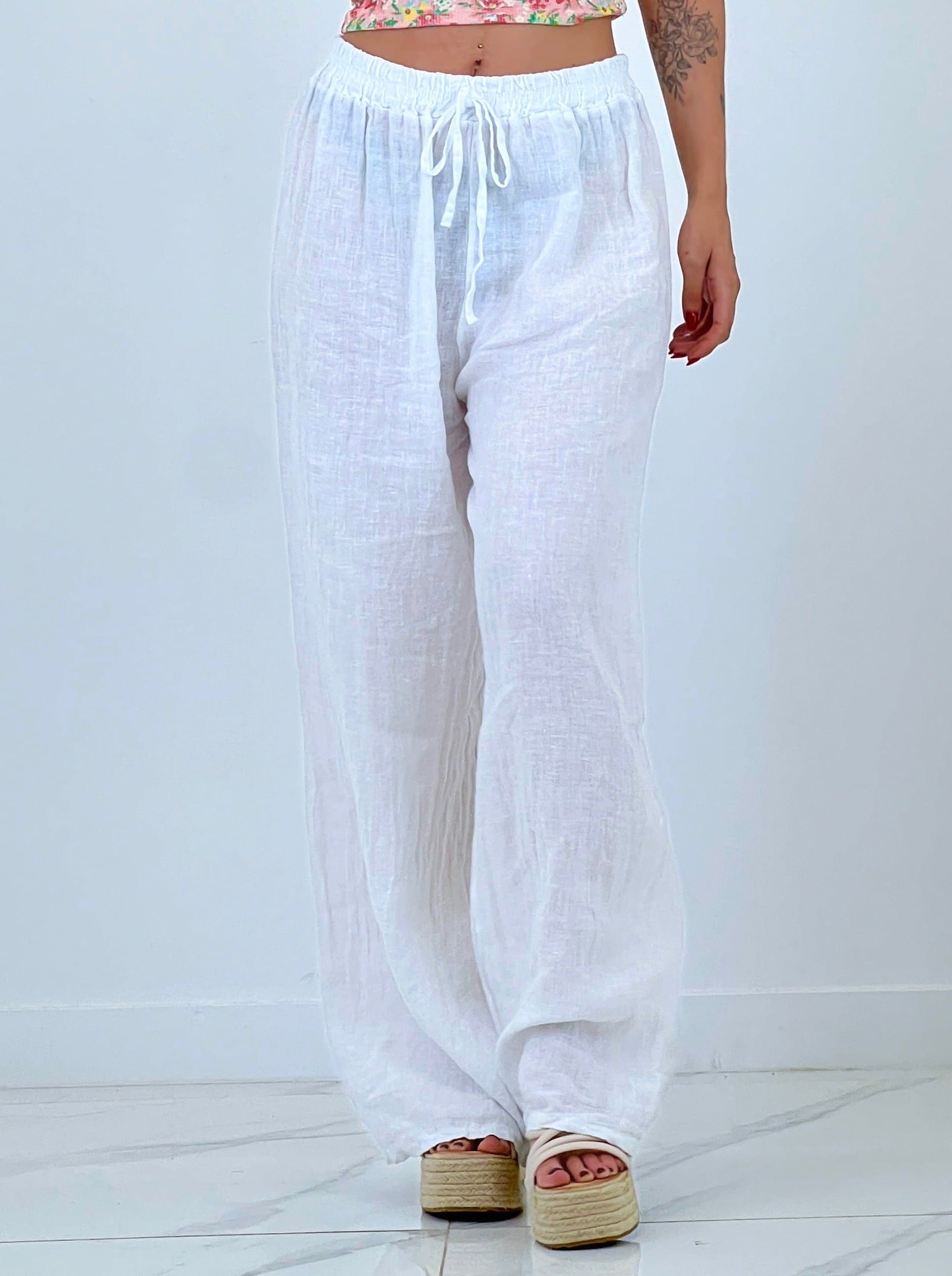 Linen flared trousers with elastic