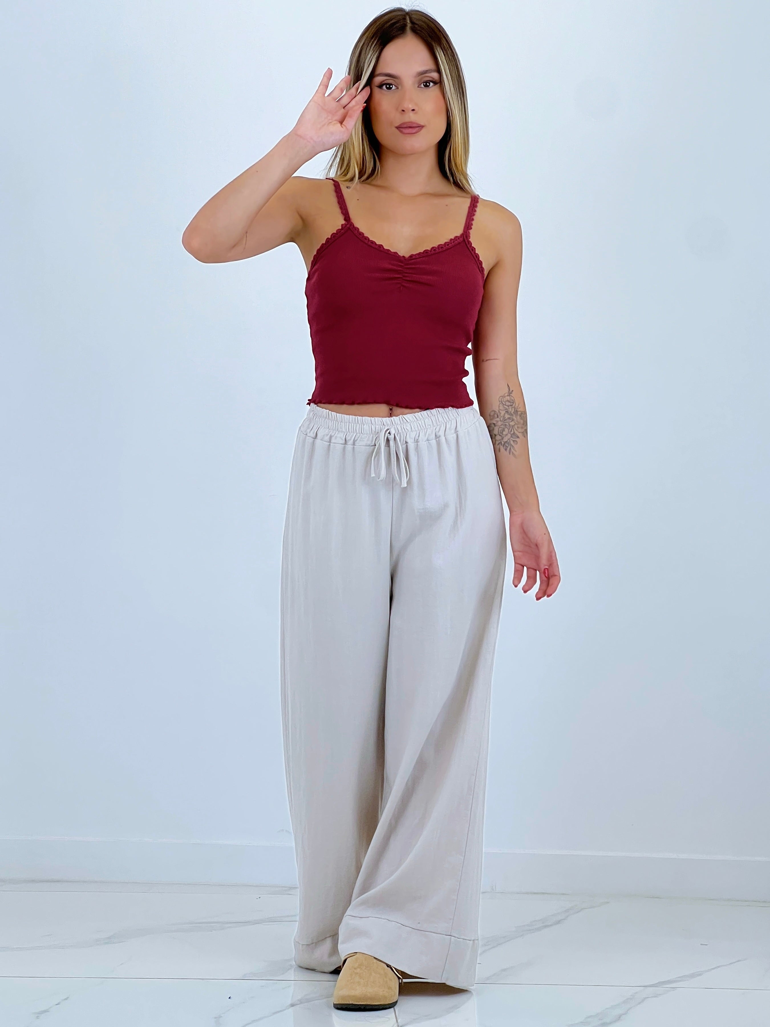 Linen flared trousers with elastic