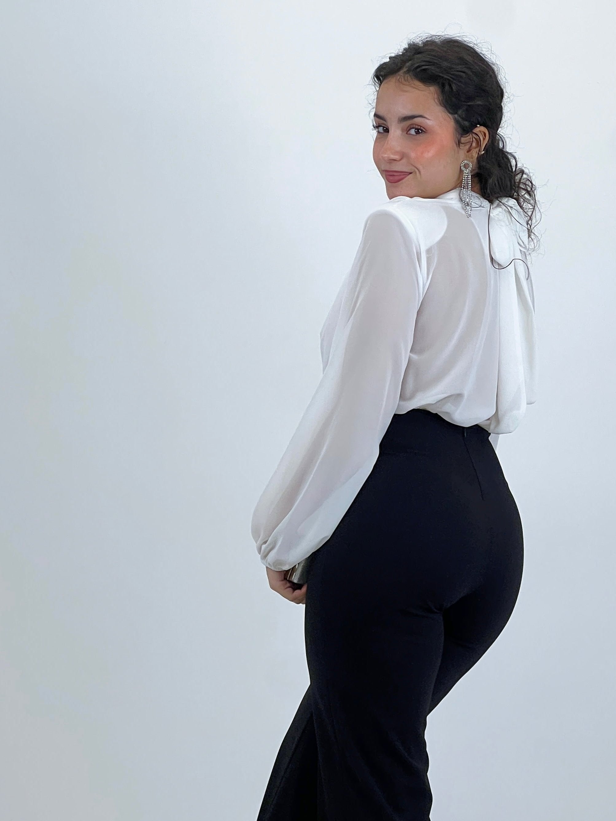 Long-sleeved choker jumpsuit with transparencies