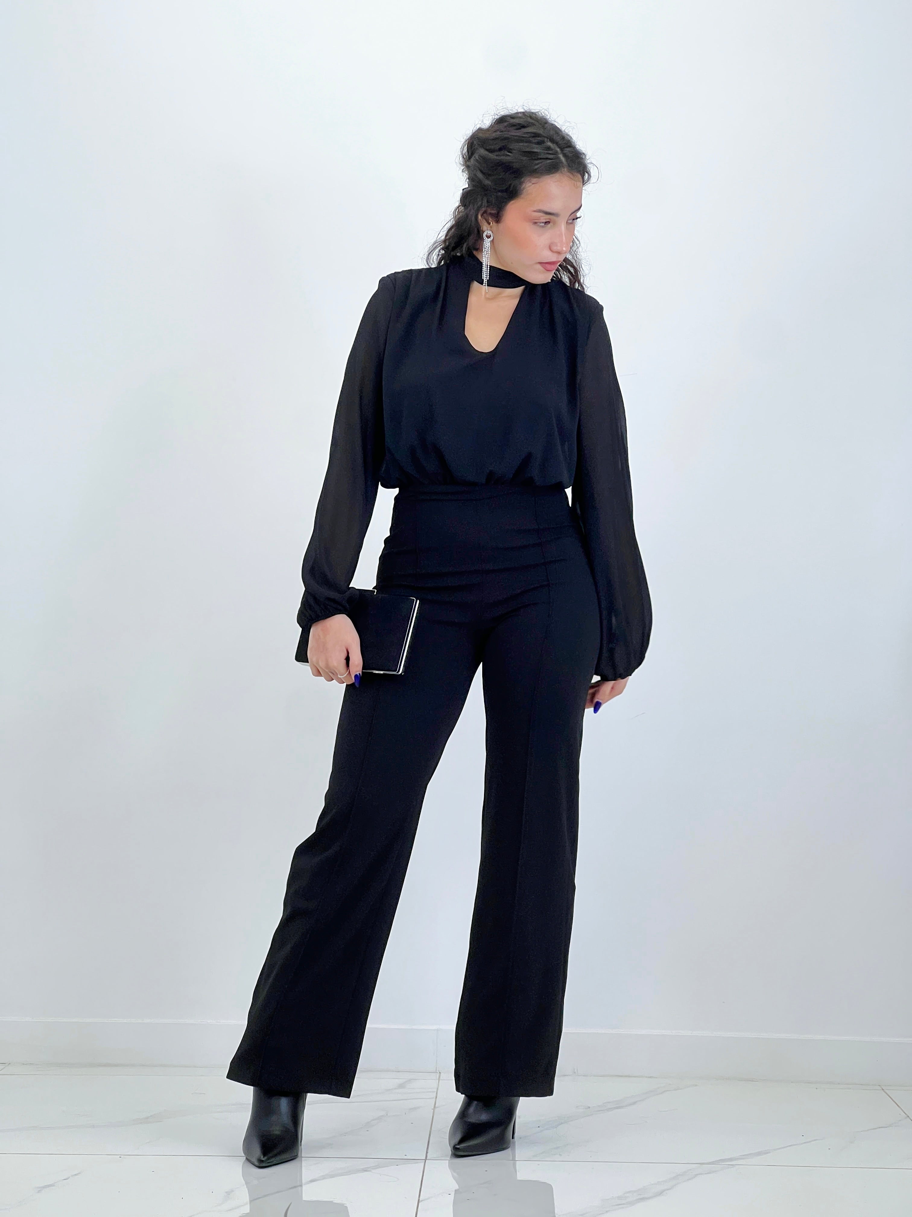 Long-sleeved choker jumpsuit with transparencies