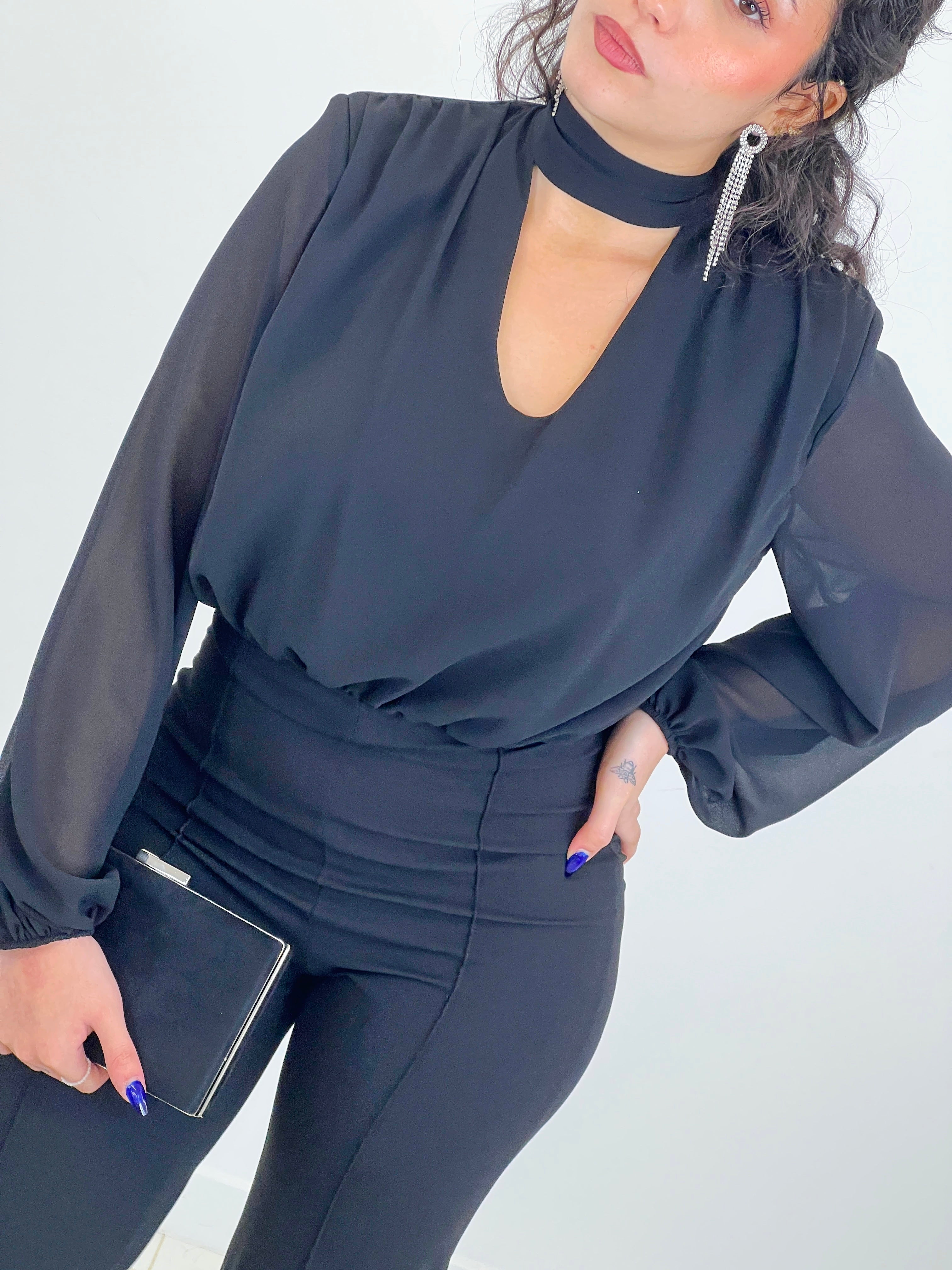Long-sleeved choker jumpsuit with transparencies