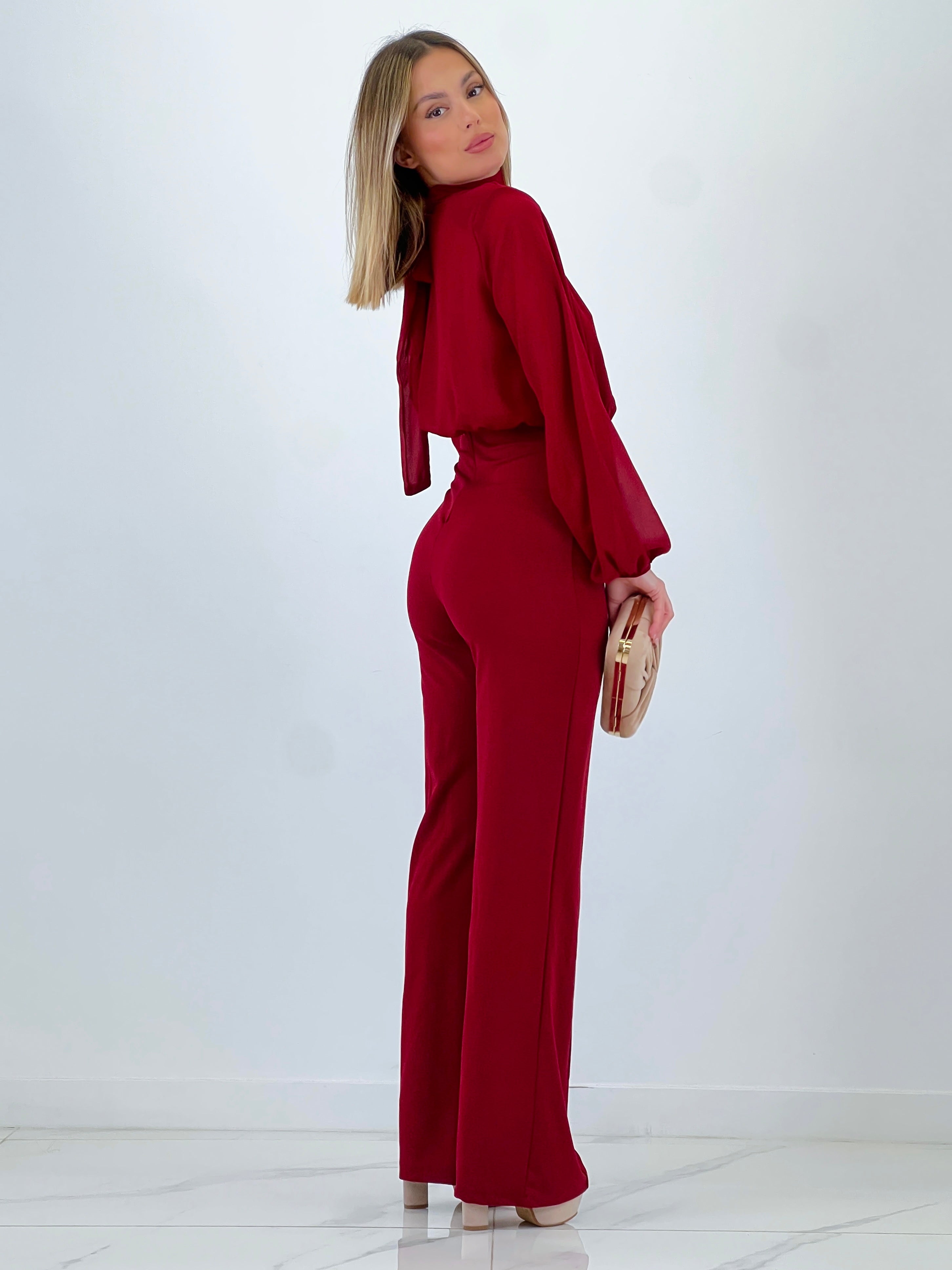 Long-sleeved choker jumpsuit with transparencies