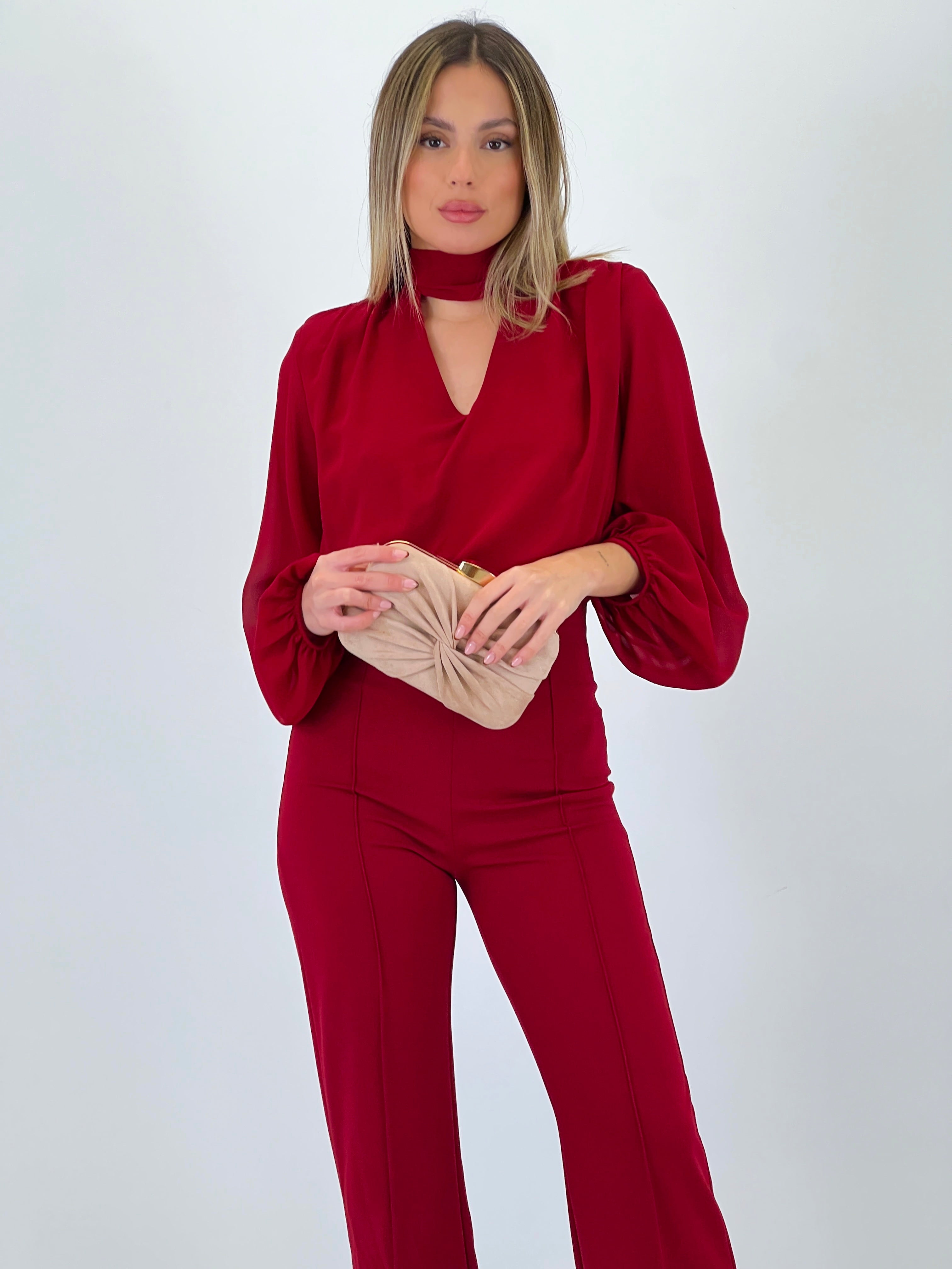 Long-sleeved choker jumpsuit with transparencies