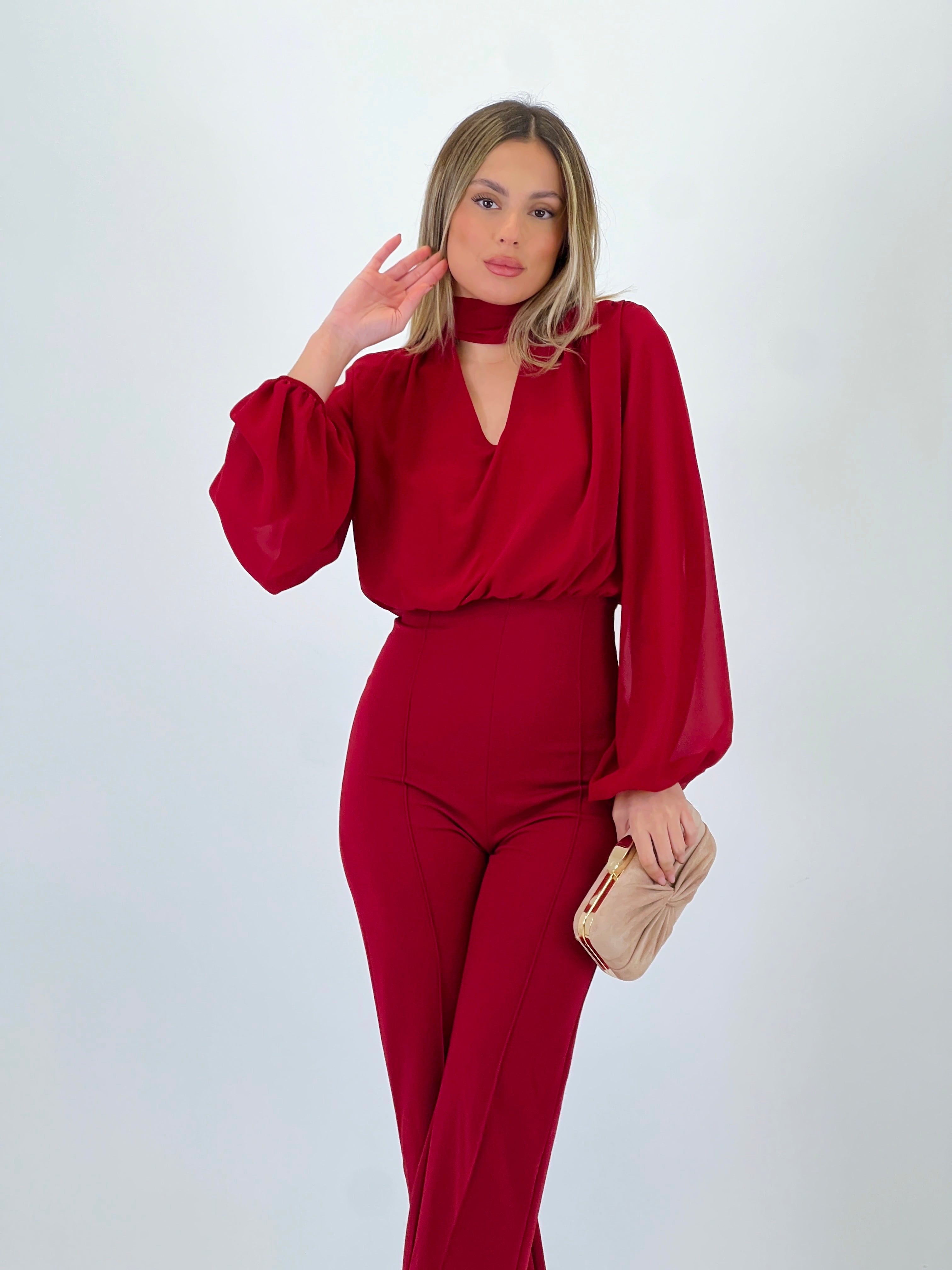 Long-sleeved choker jumpsuit with transparencies