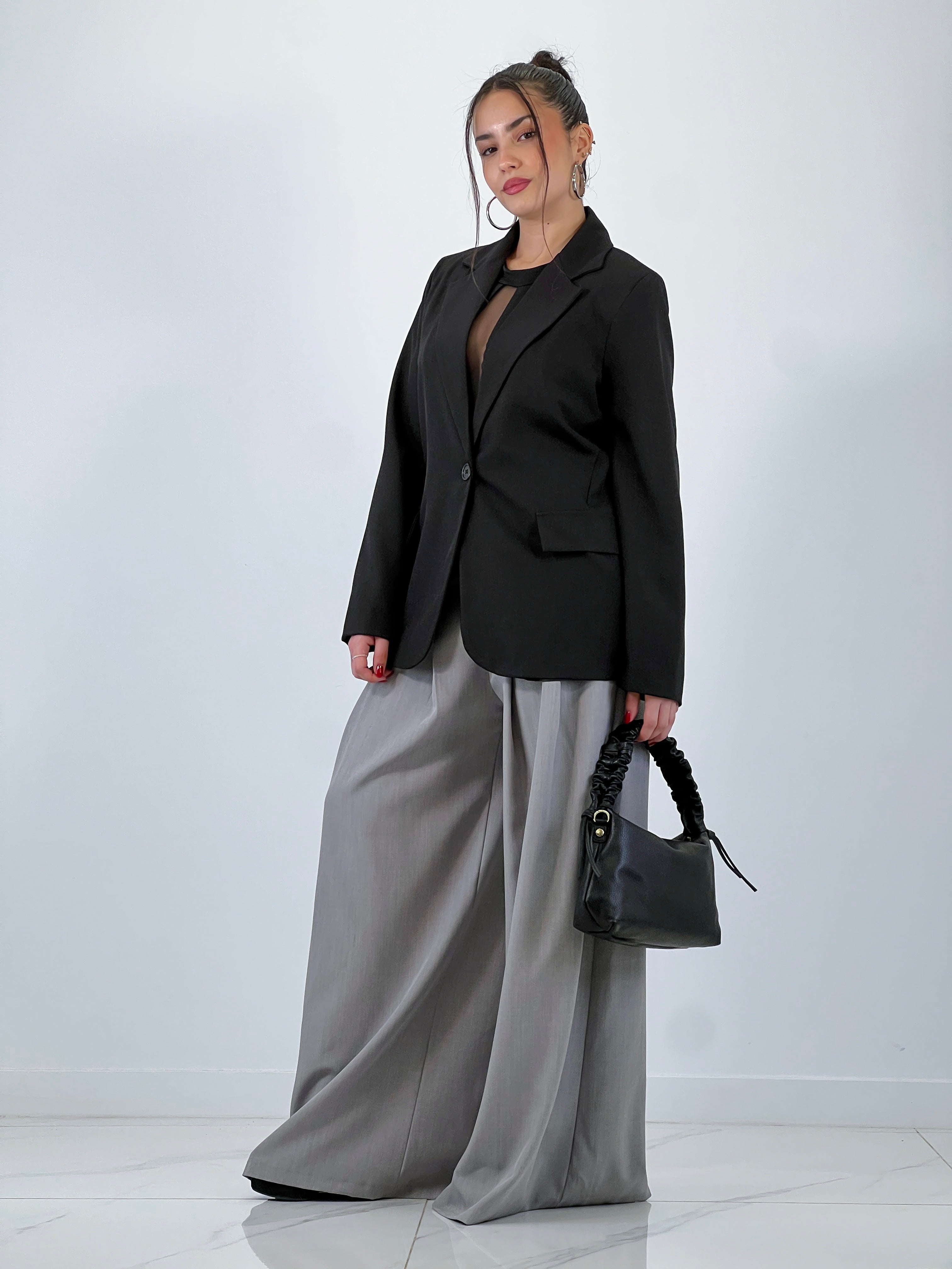 Pantalón pinzas suelto