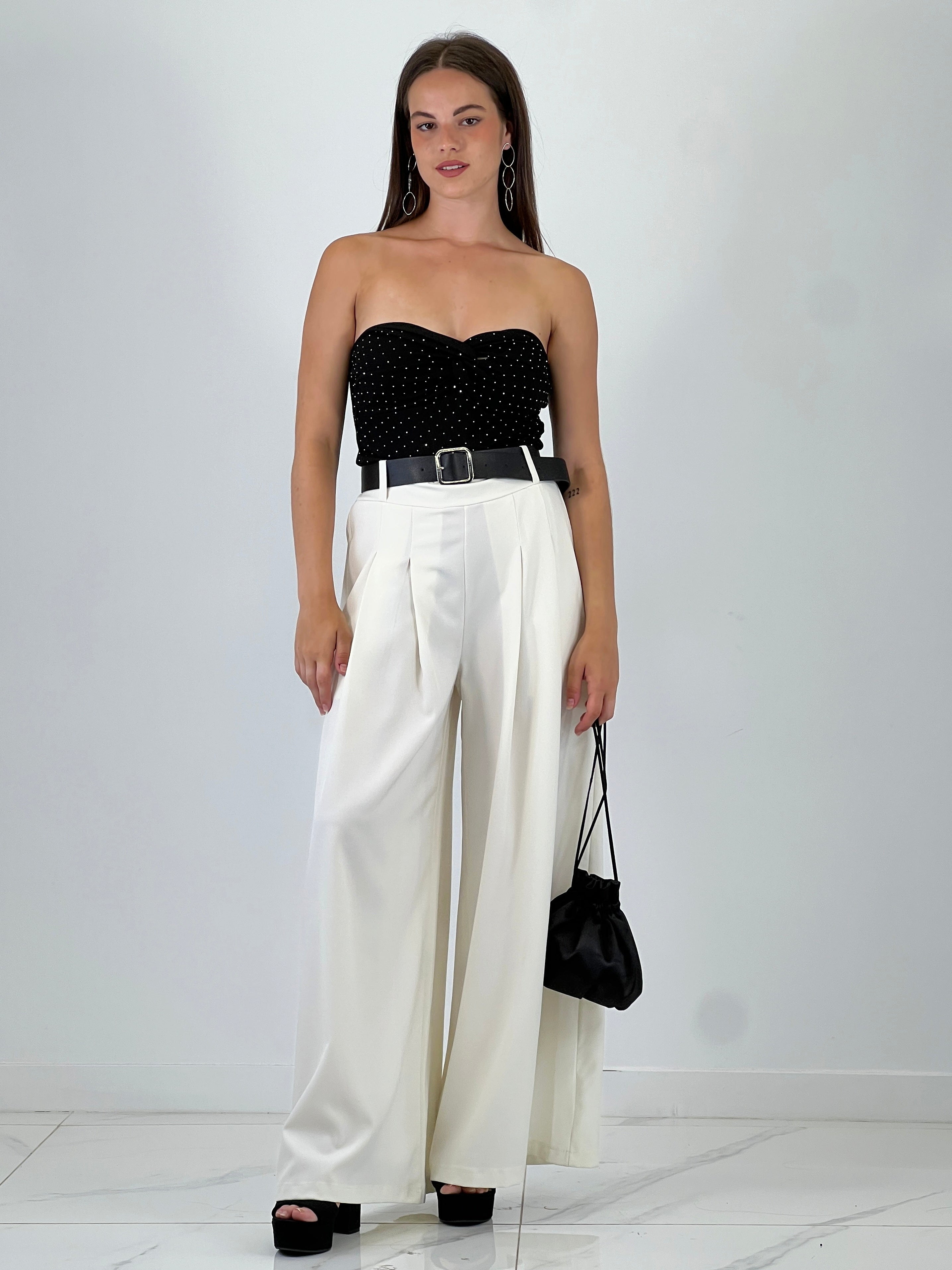 Pantalón pinzas suelto