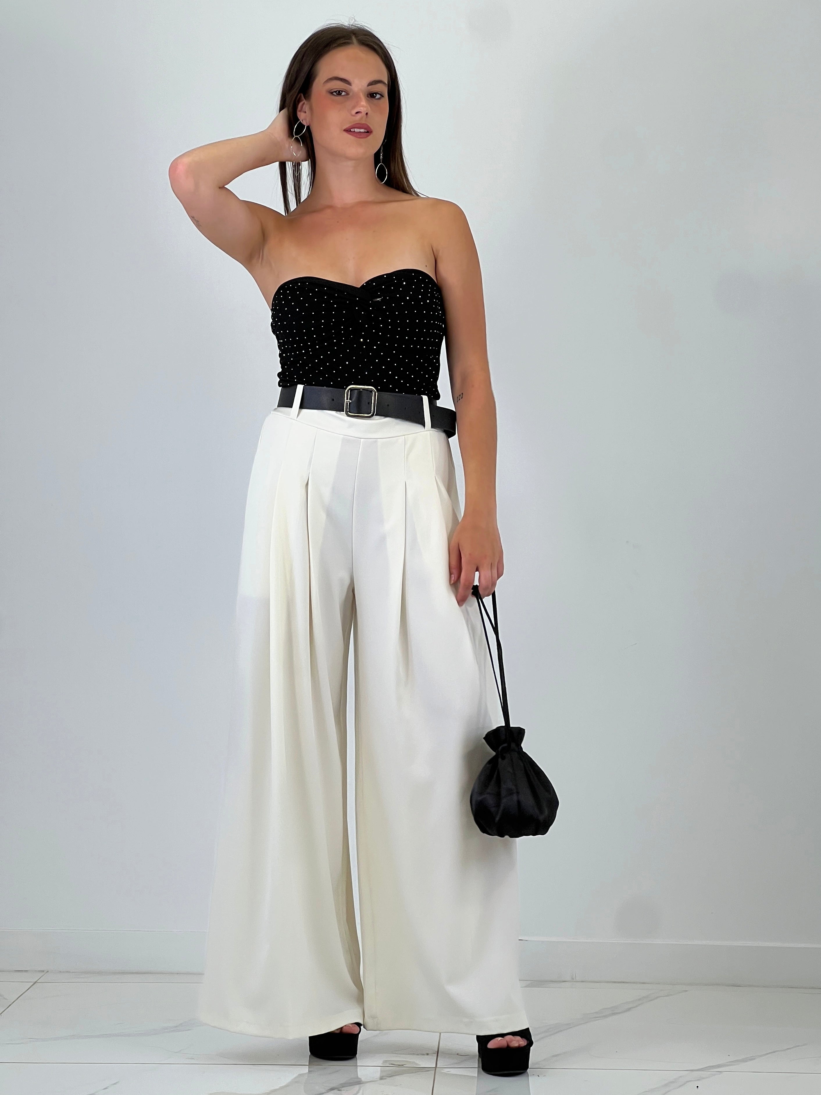 Pantalón pinzas suelto