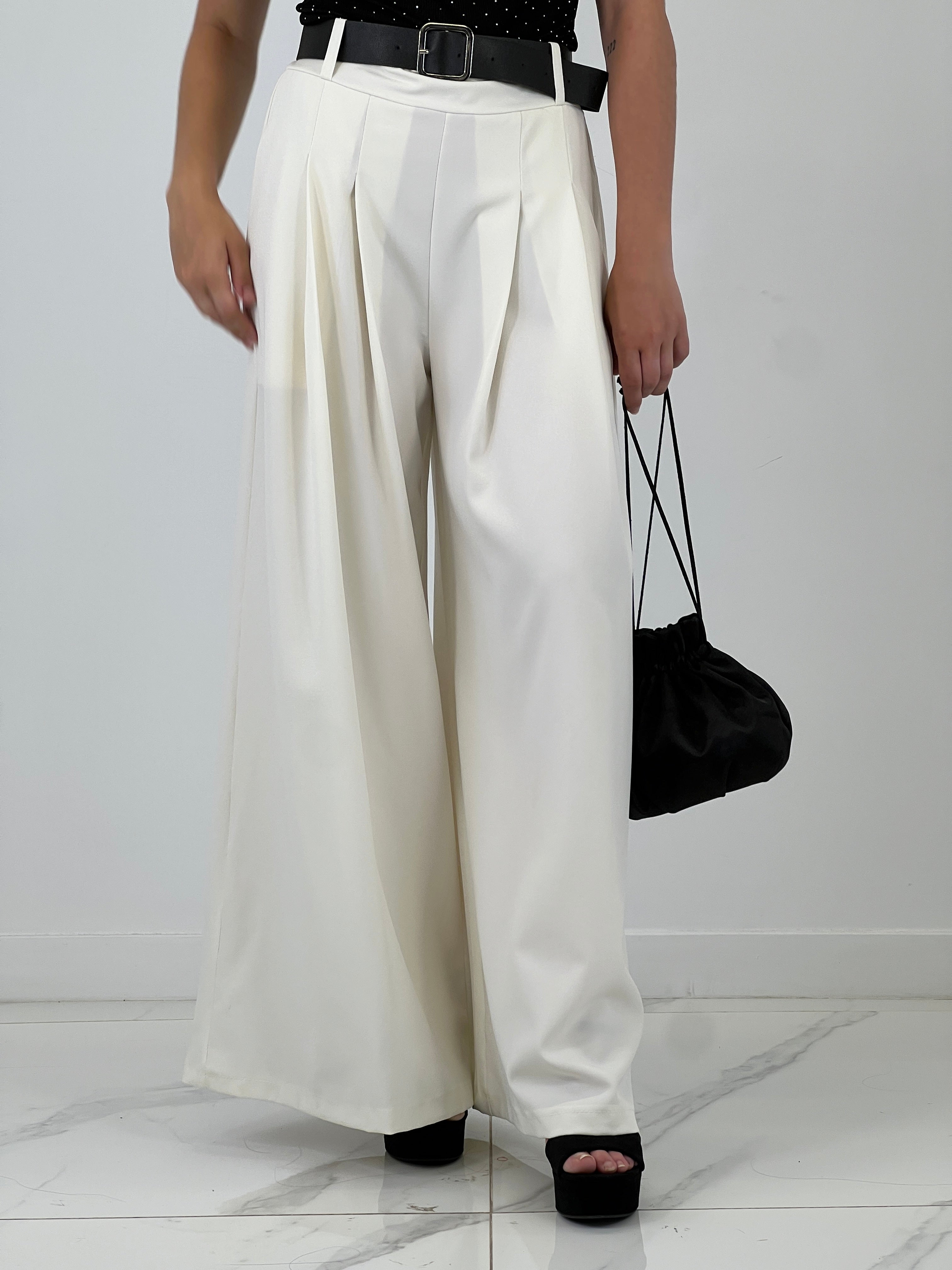 Pantalón pinzas suelto