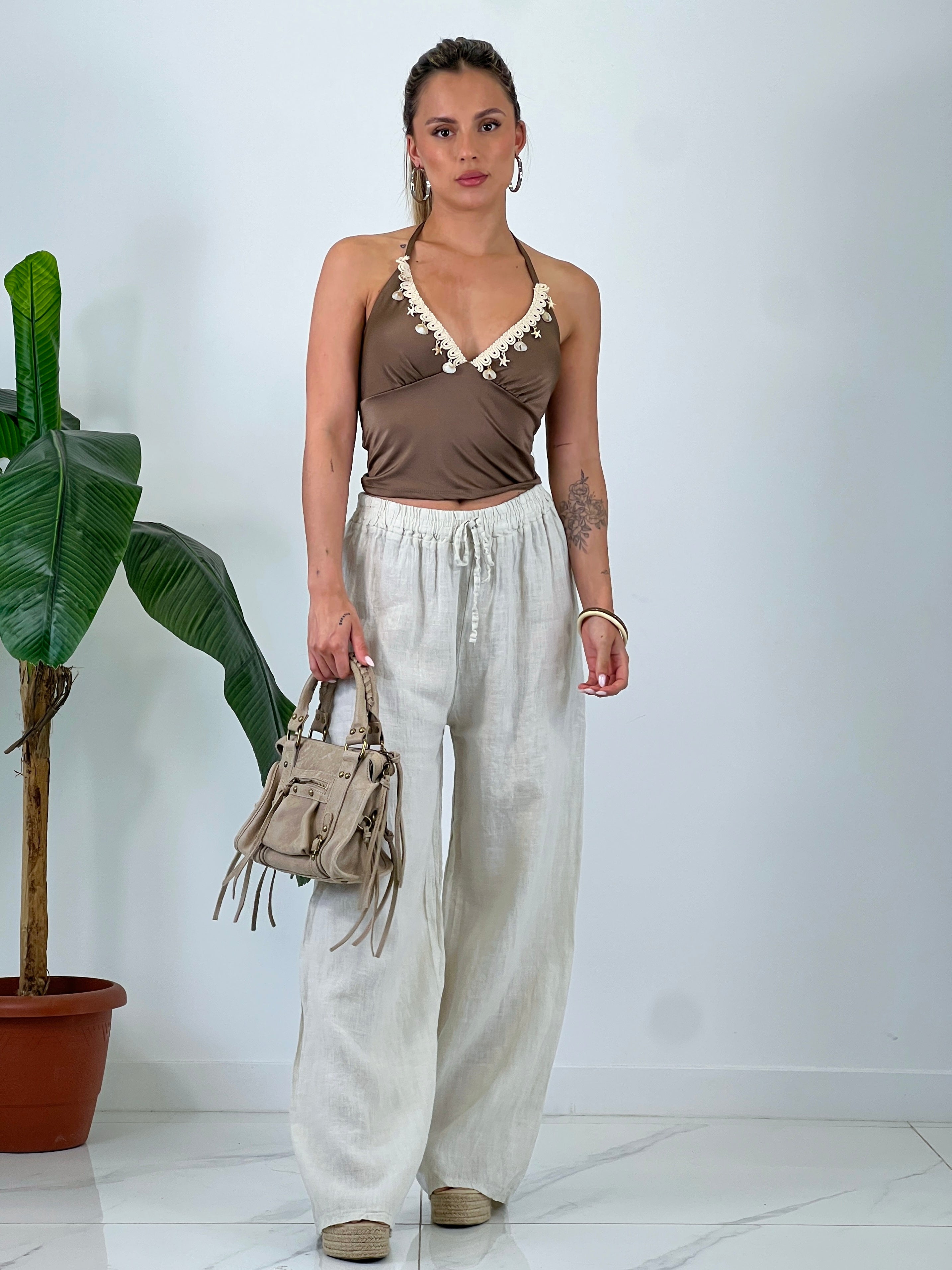 Linen flared trousers with elastic