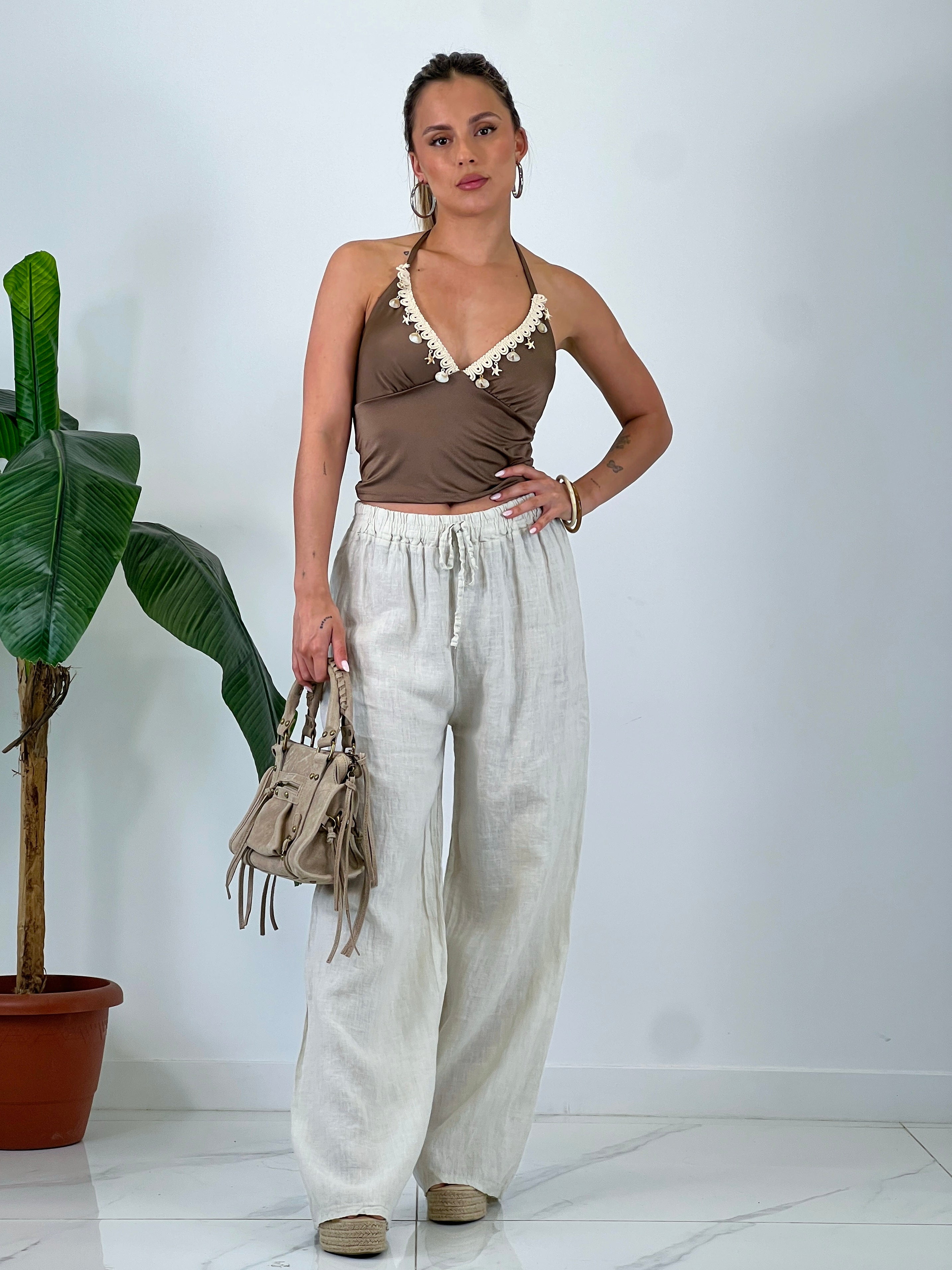 Linen flared trousers with elastic
