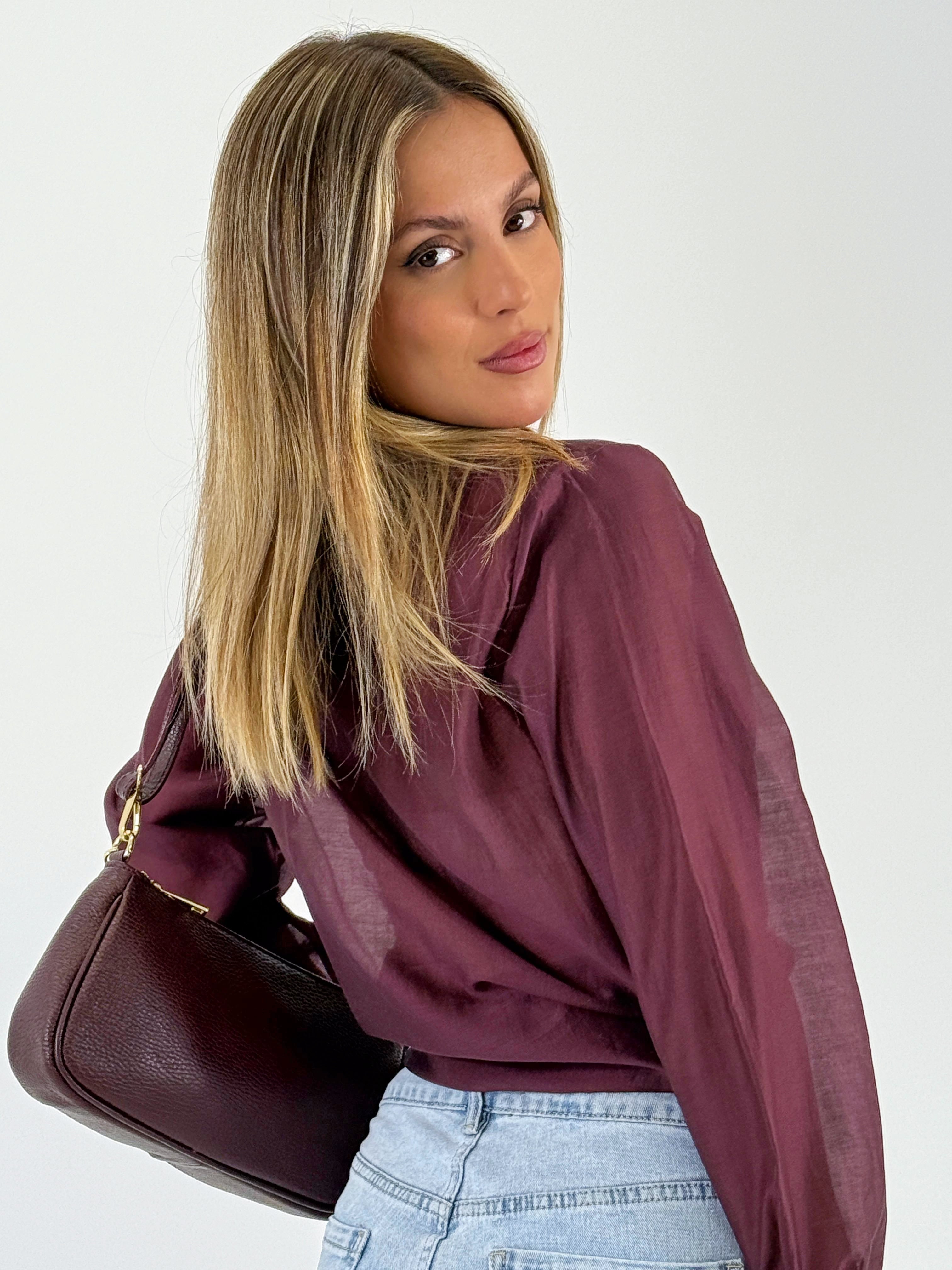 Blusa transparencia nudo