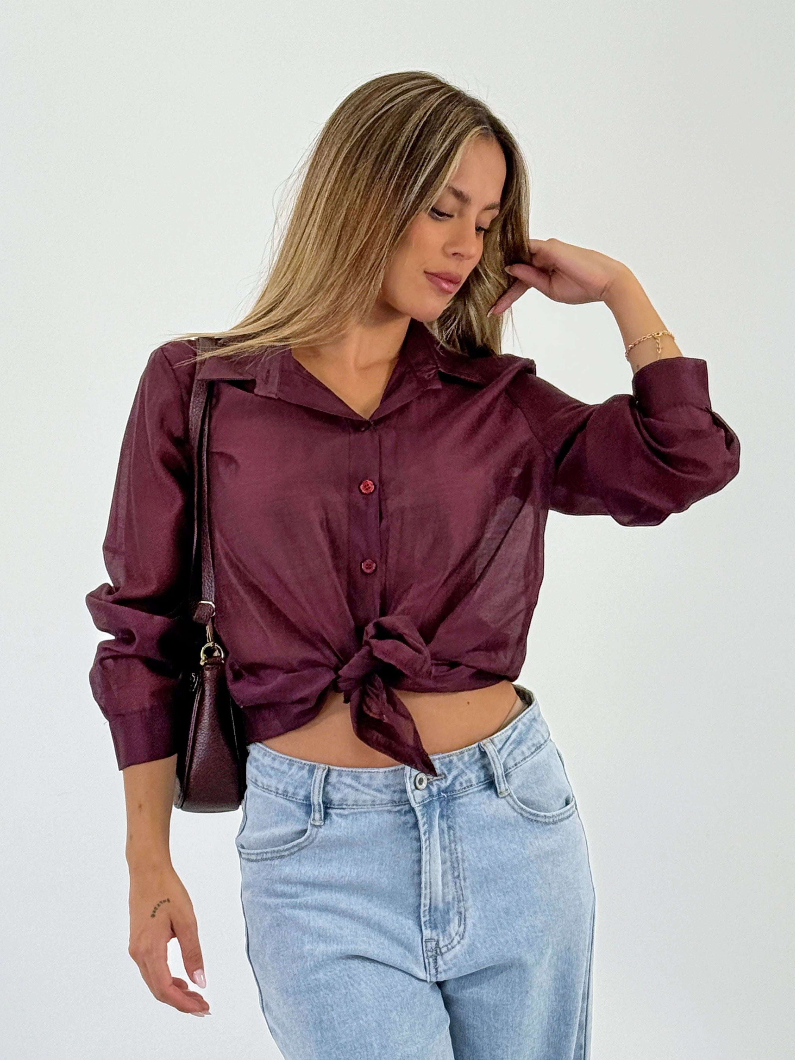 Blusa transparencia nudo