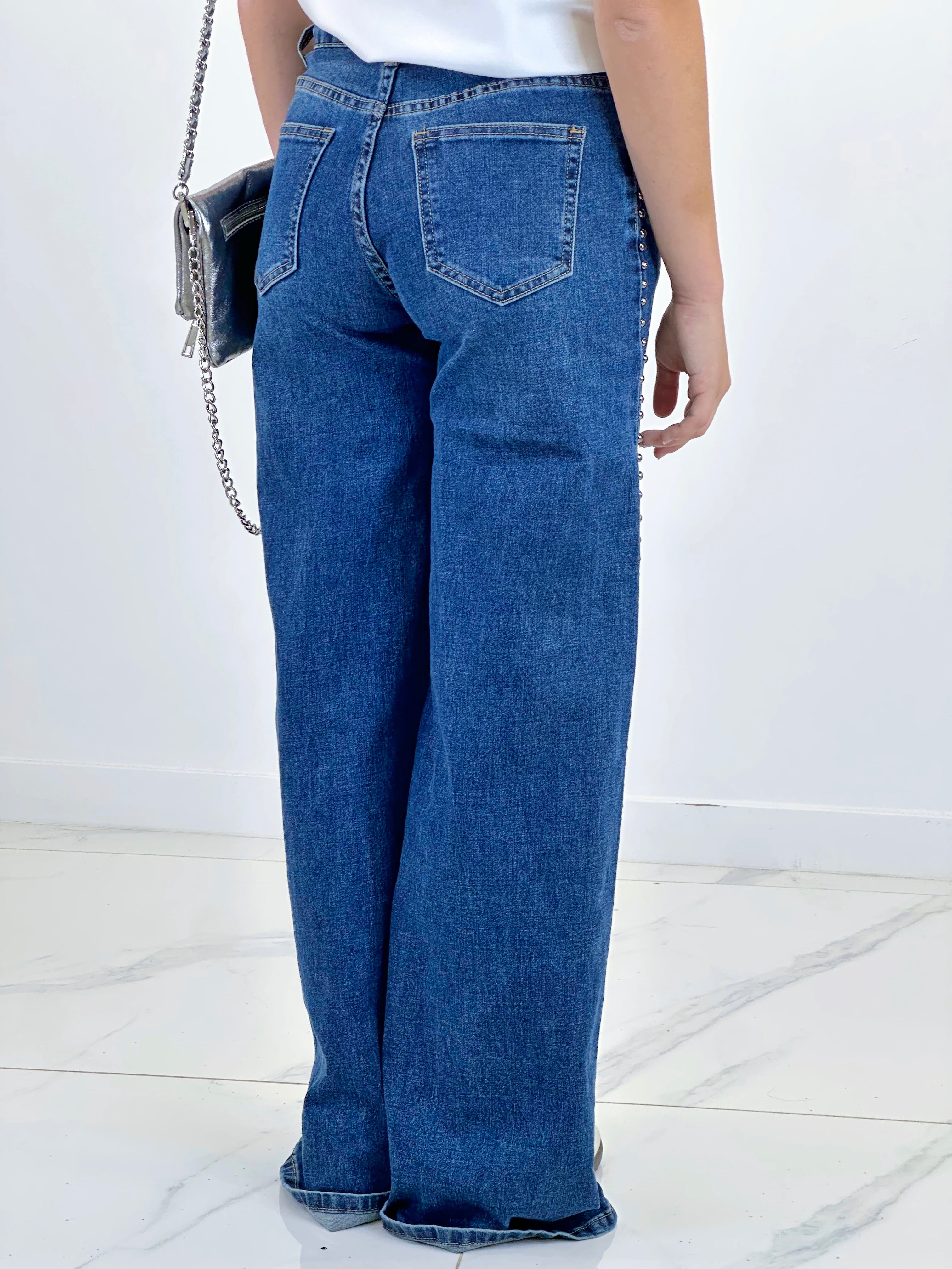 Jeans wide leg tachuelas