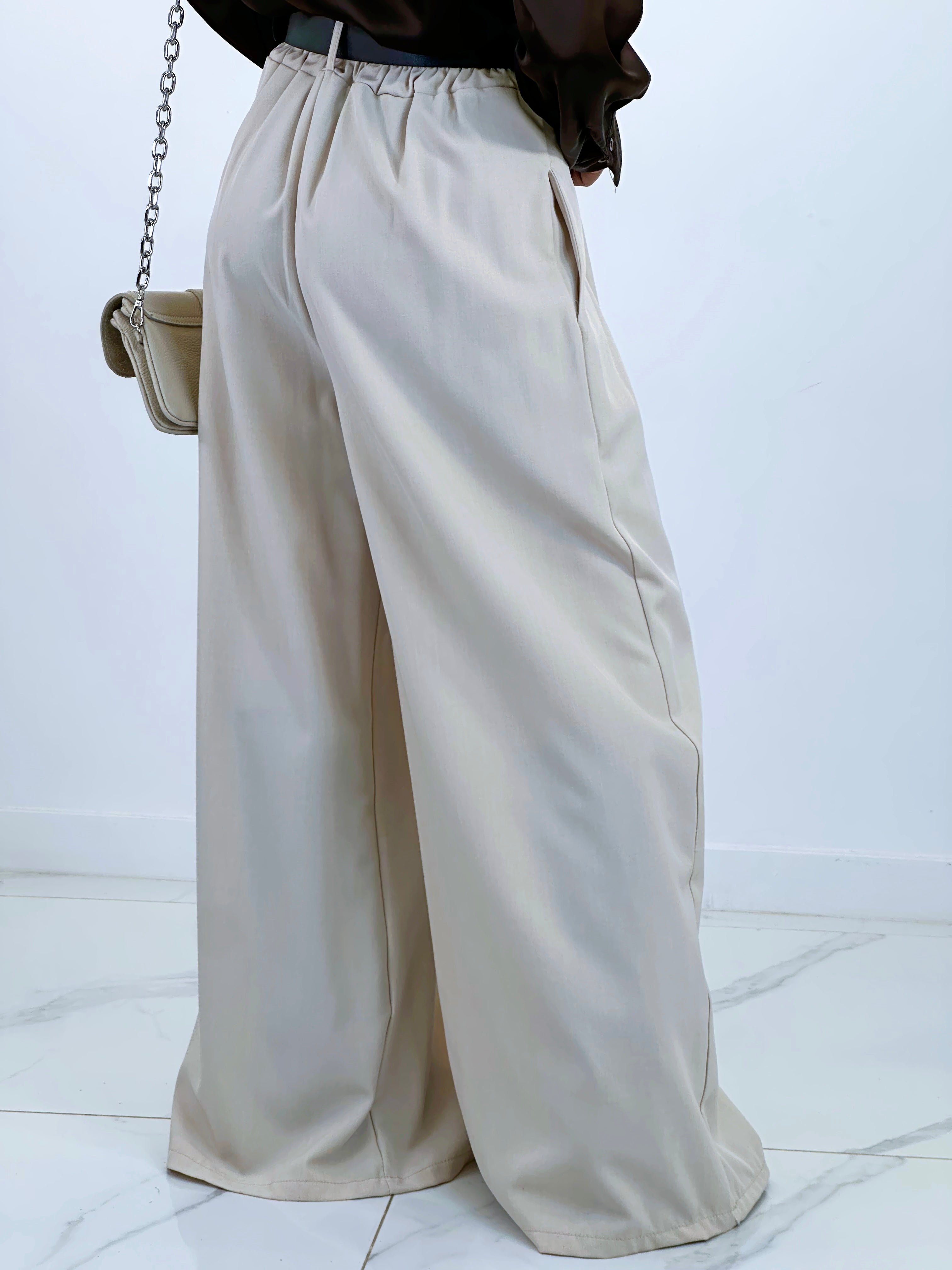 Pantalón pinzas suelto