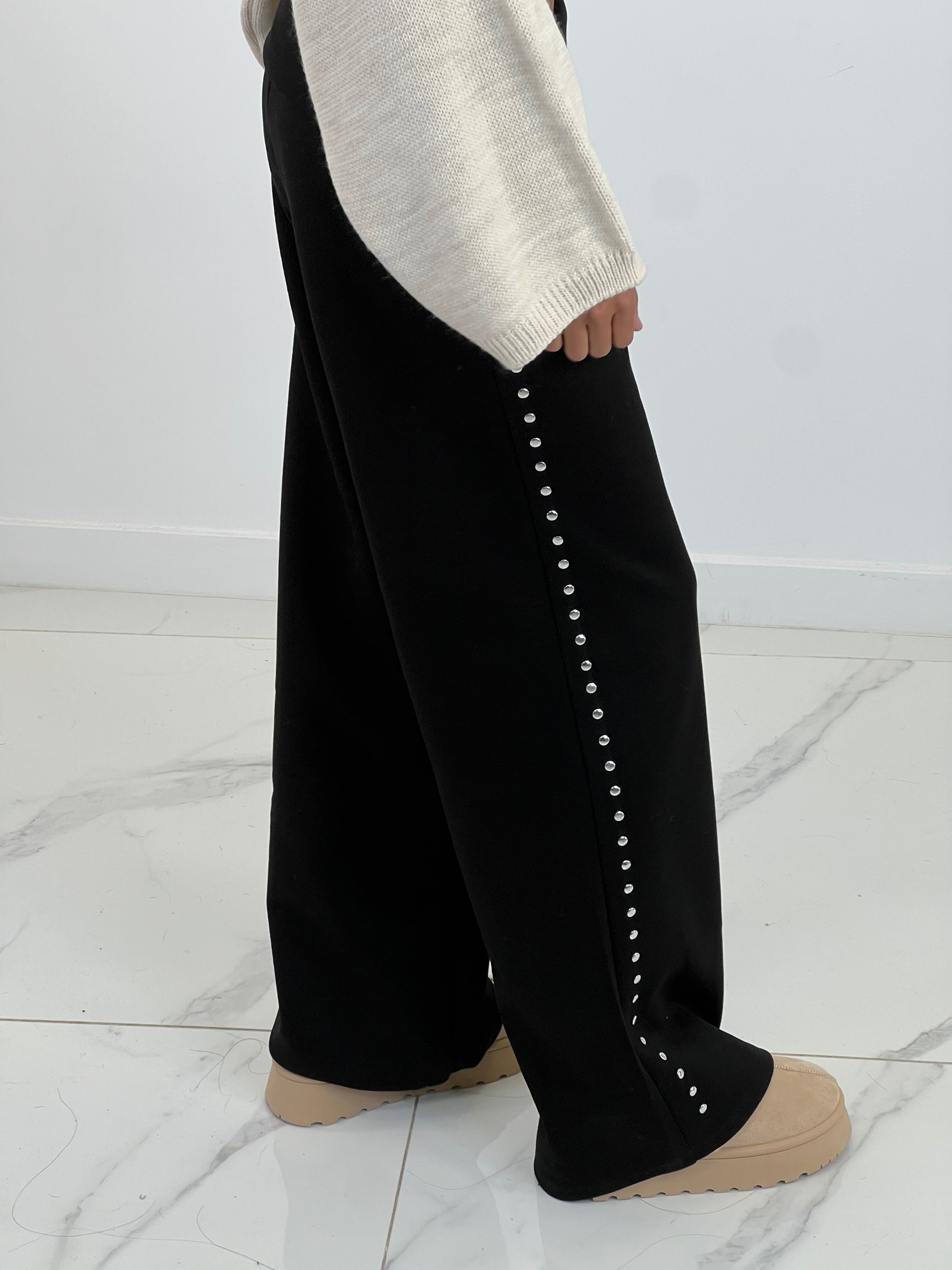 Studded pants with turned waist