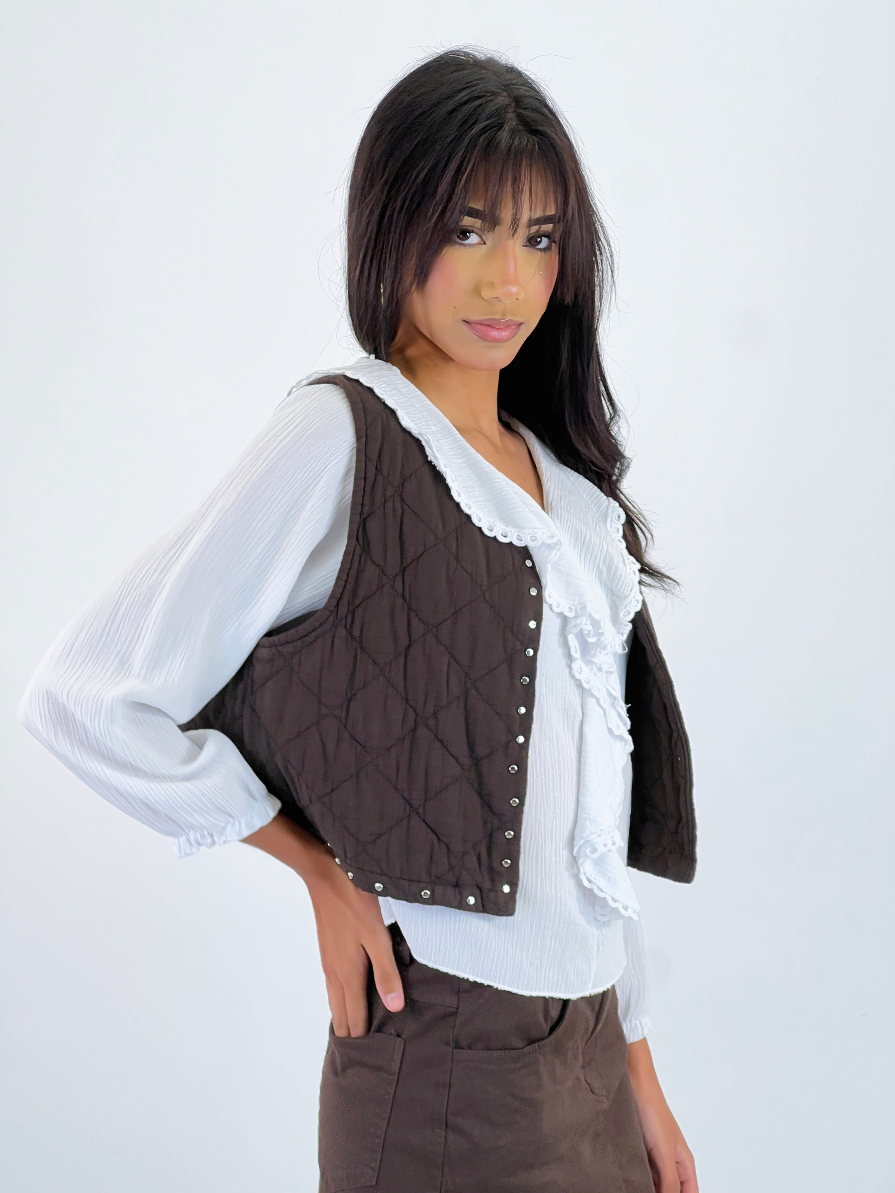 Padding vest with studs