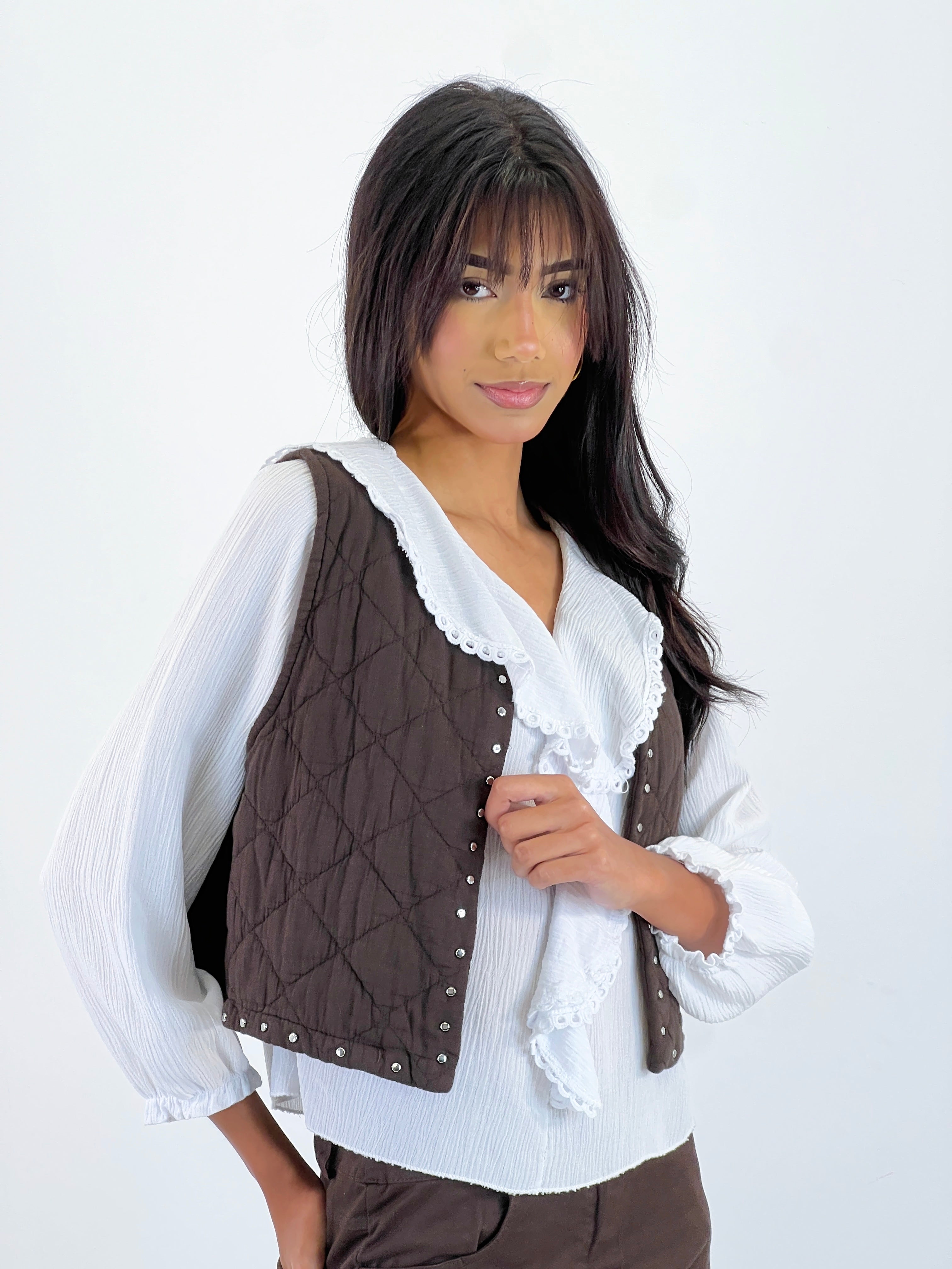 Padding vest with studs
