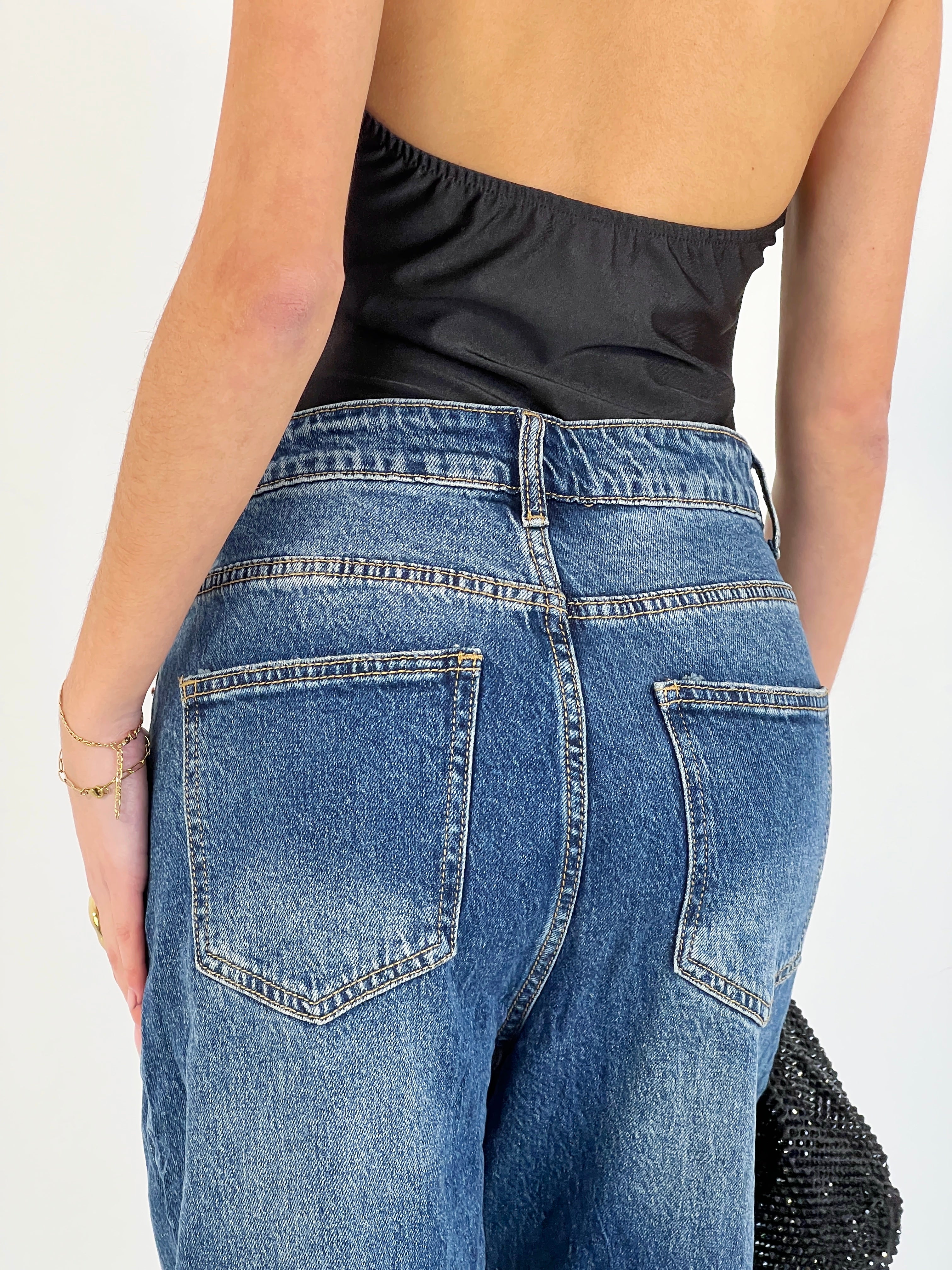 Jeans denim cintura cruzada