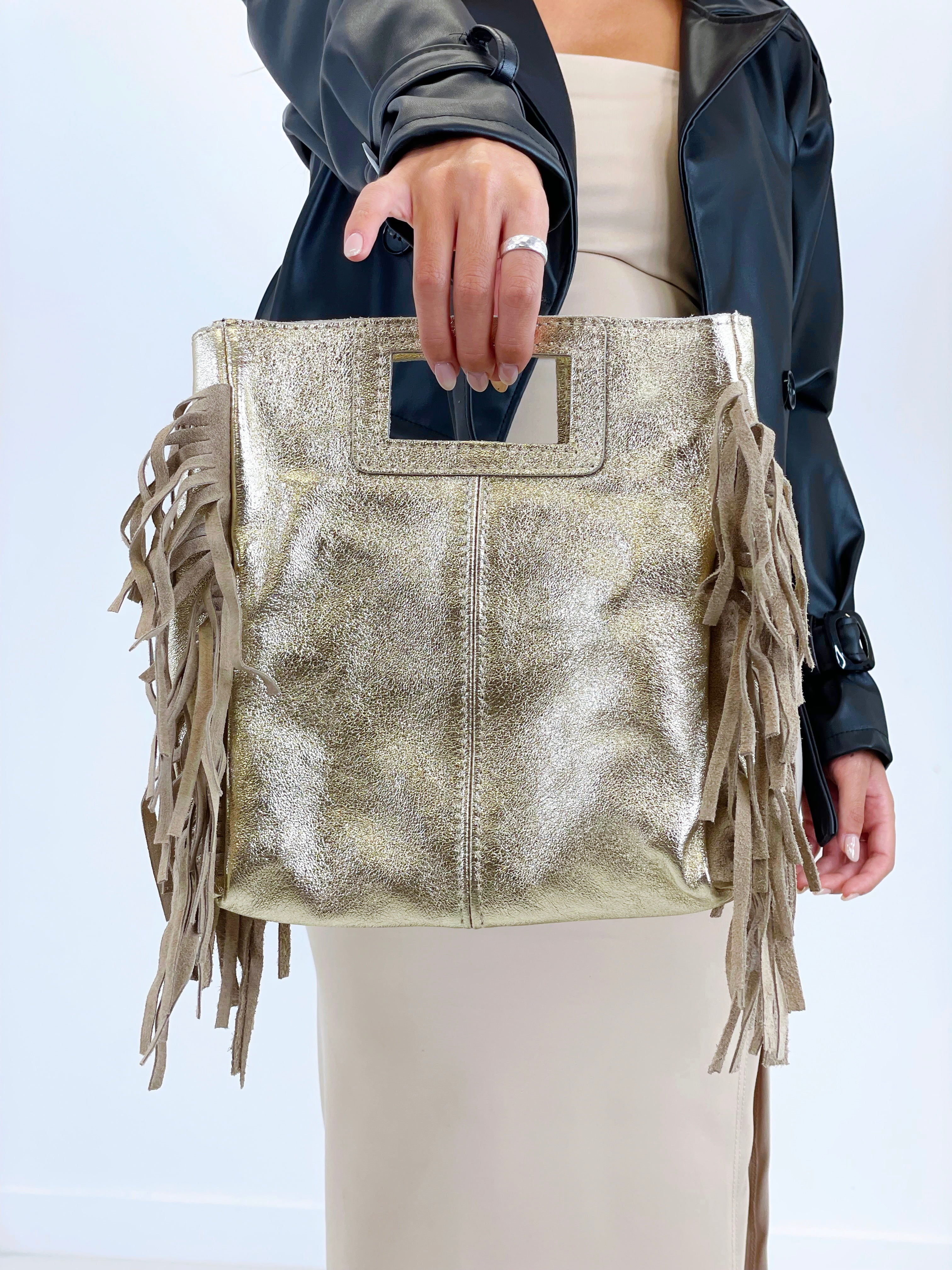 Bolso piel flecos