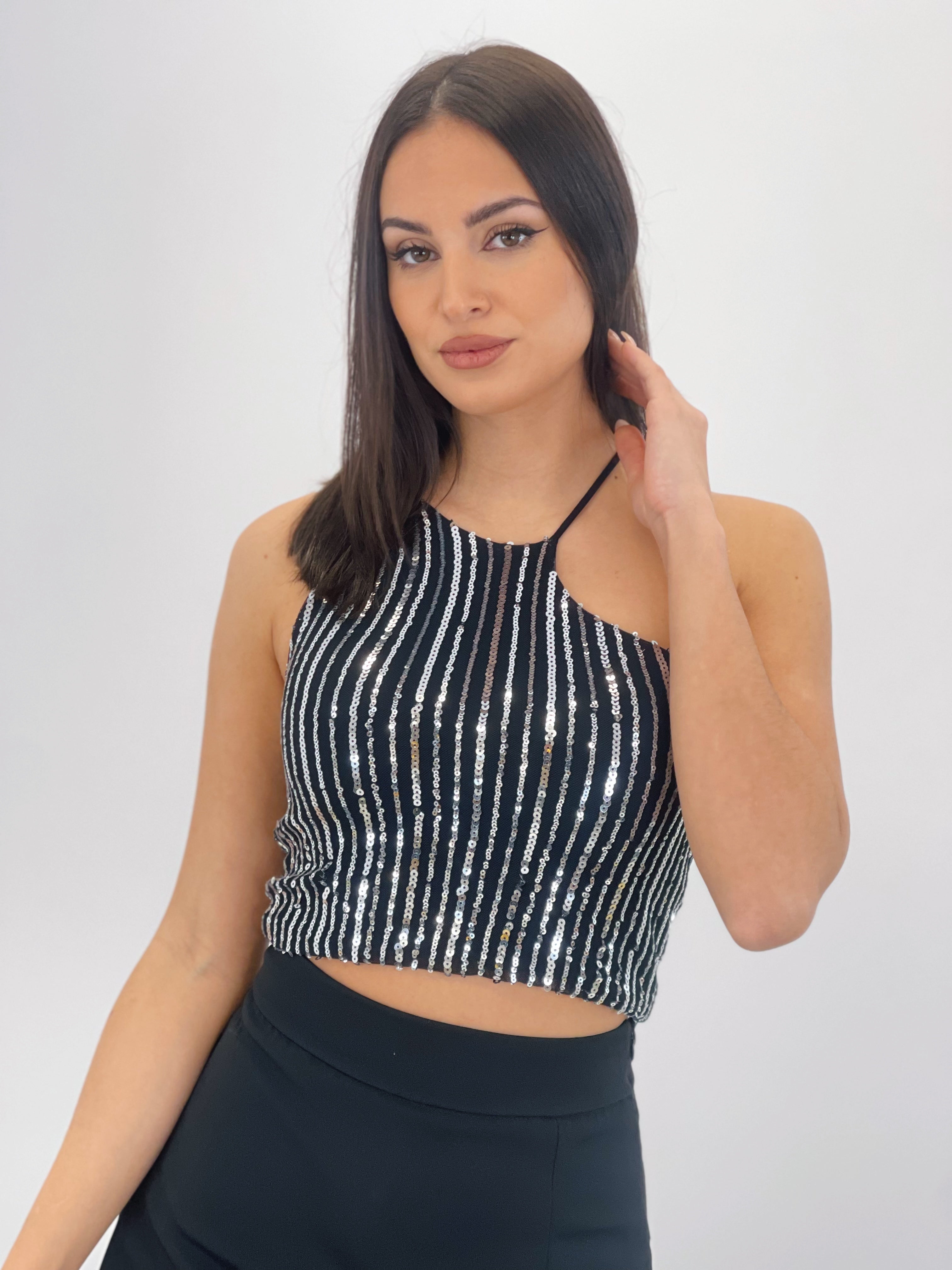 Asymmetric sequin top