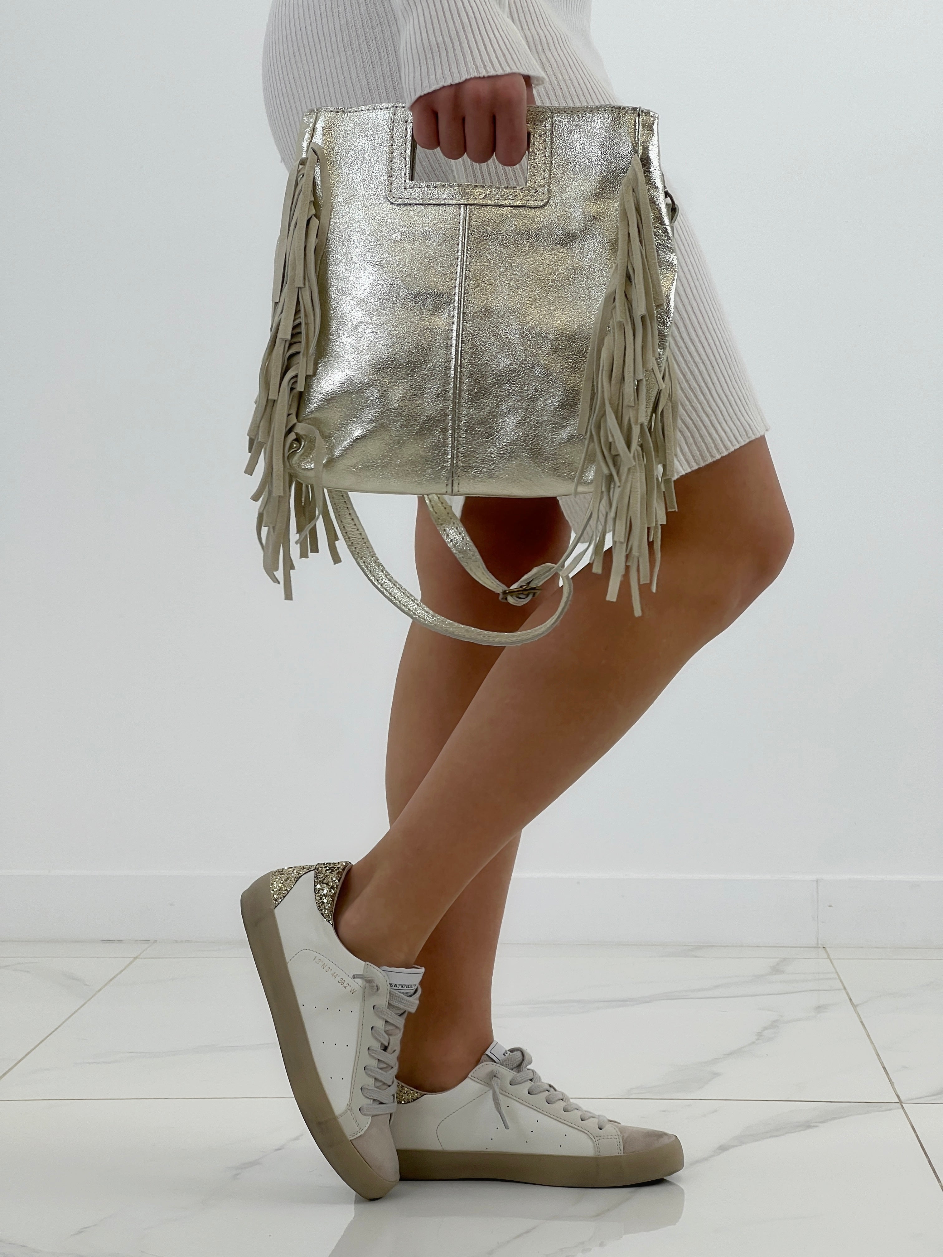 Bolso piel flecos