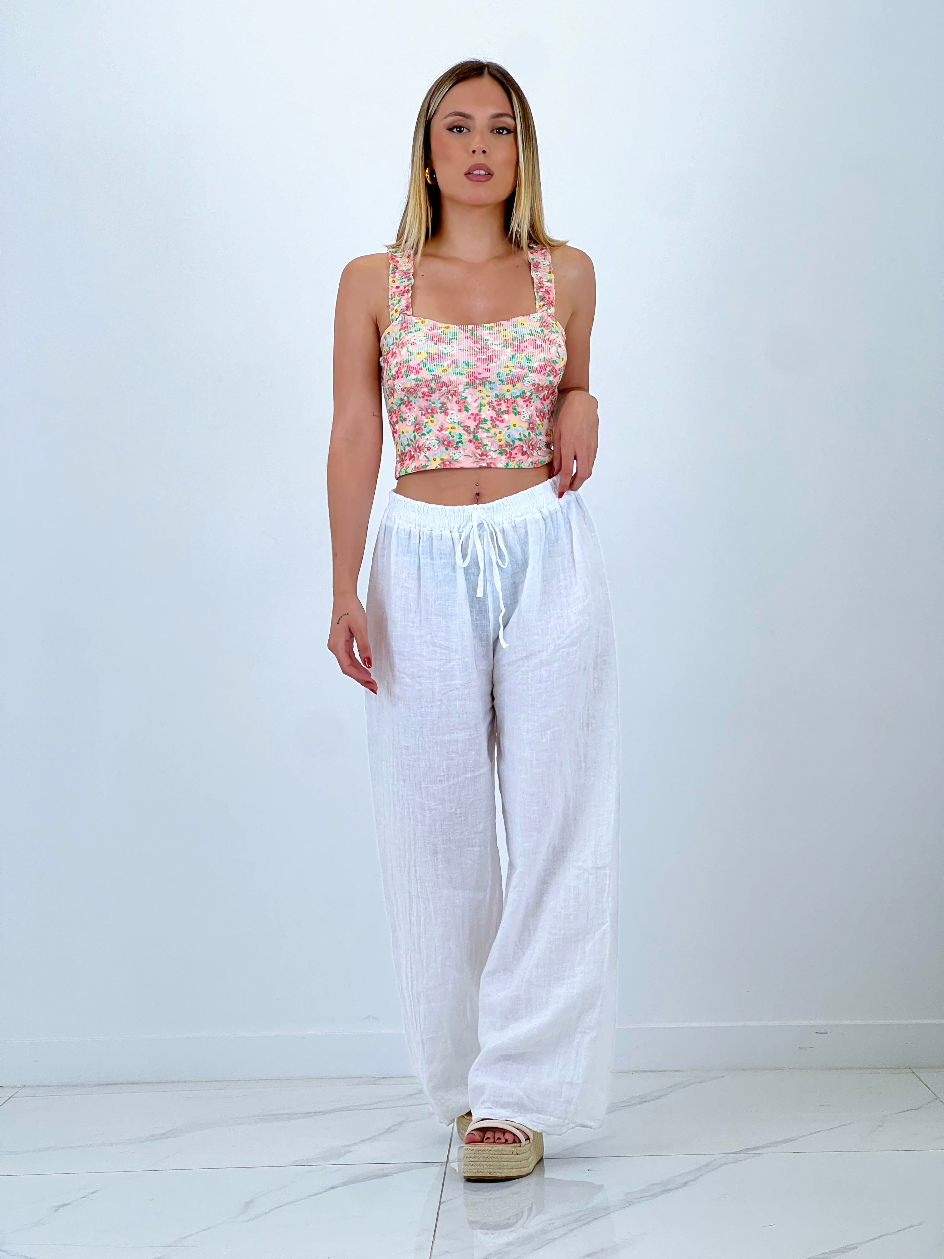 Linen flared trousers with elastic