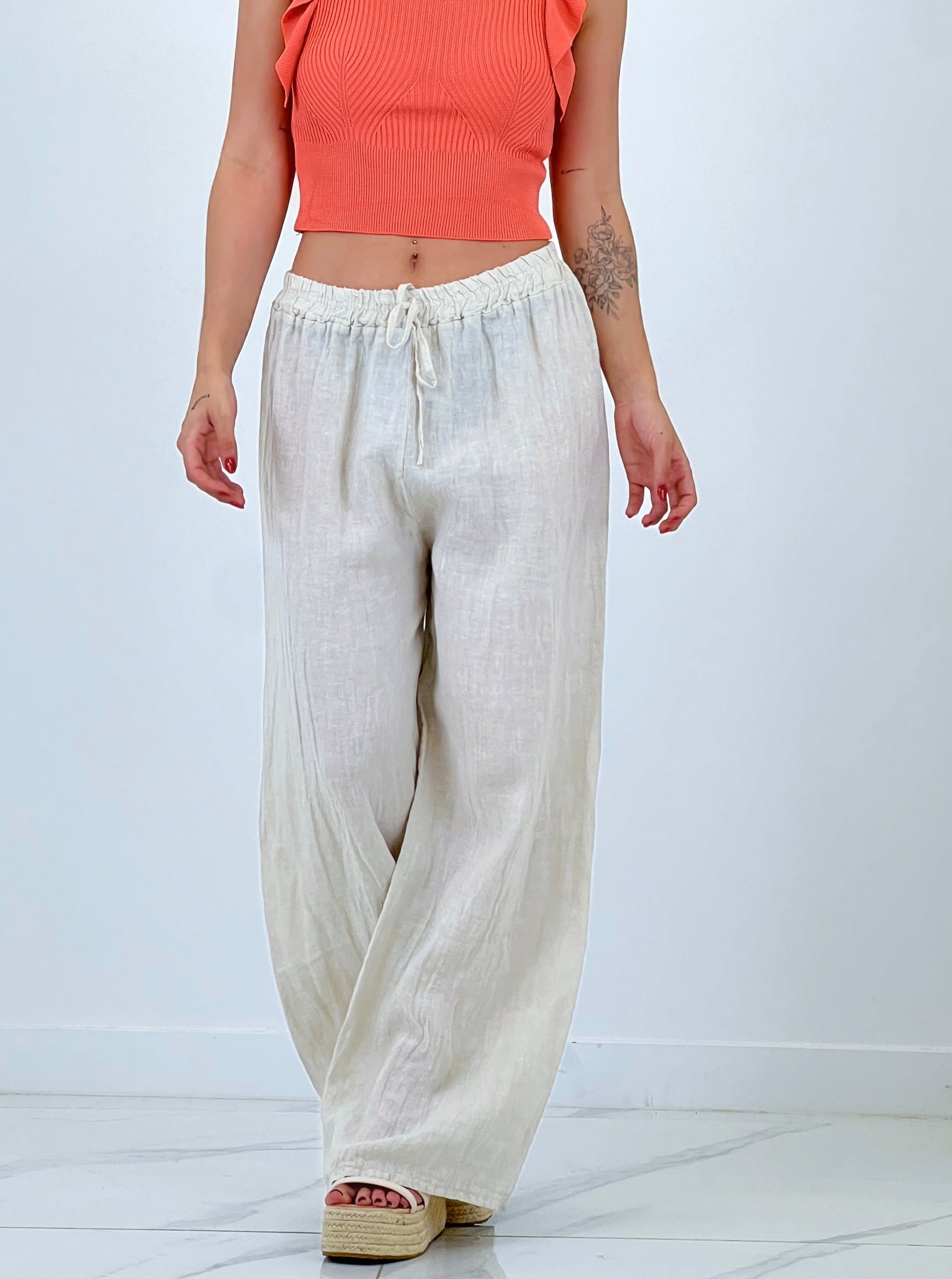 Linen flared trousers with elastic