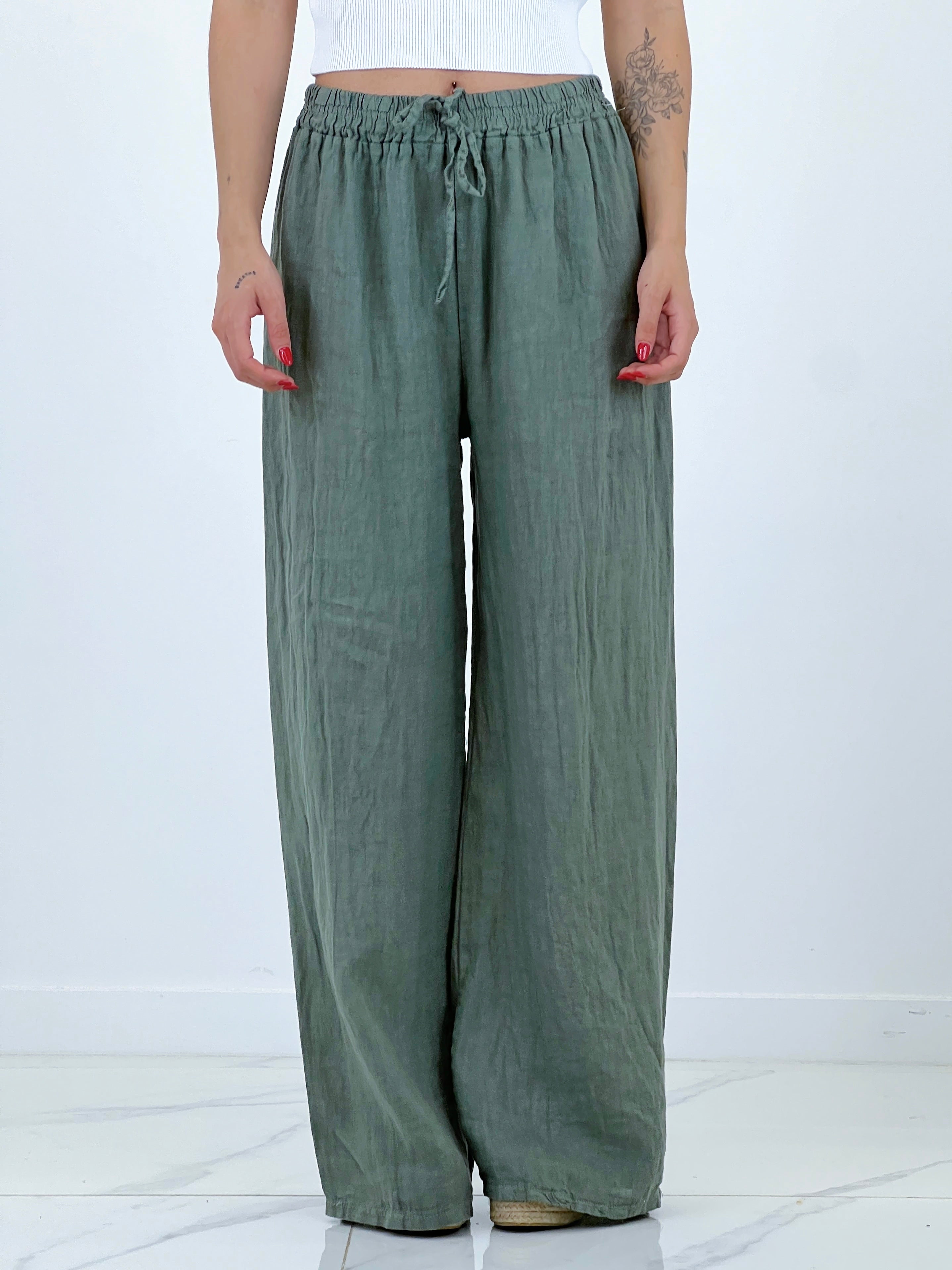 Linen flared trousers with elastic