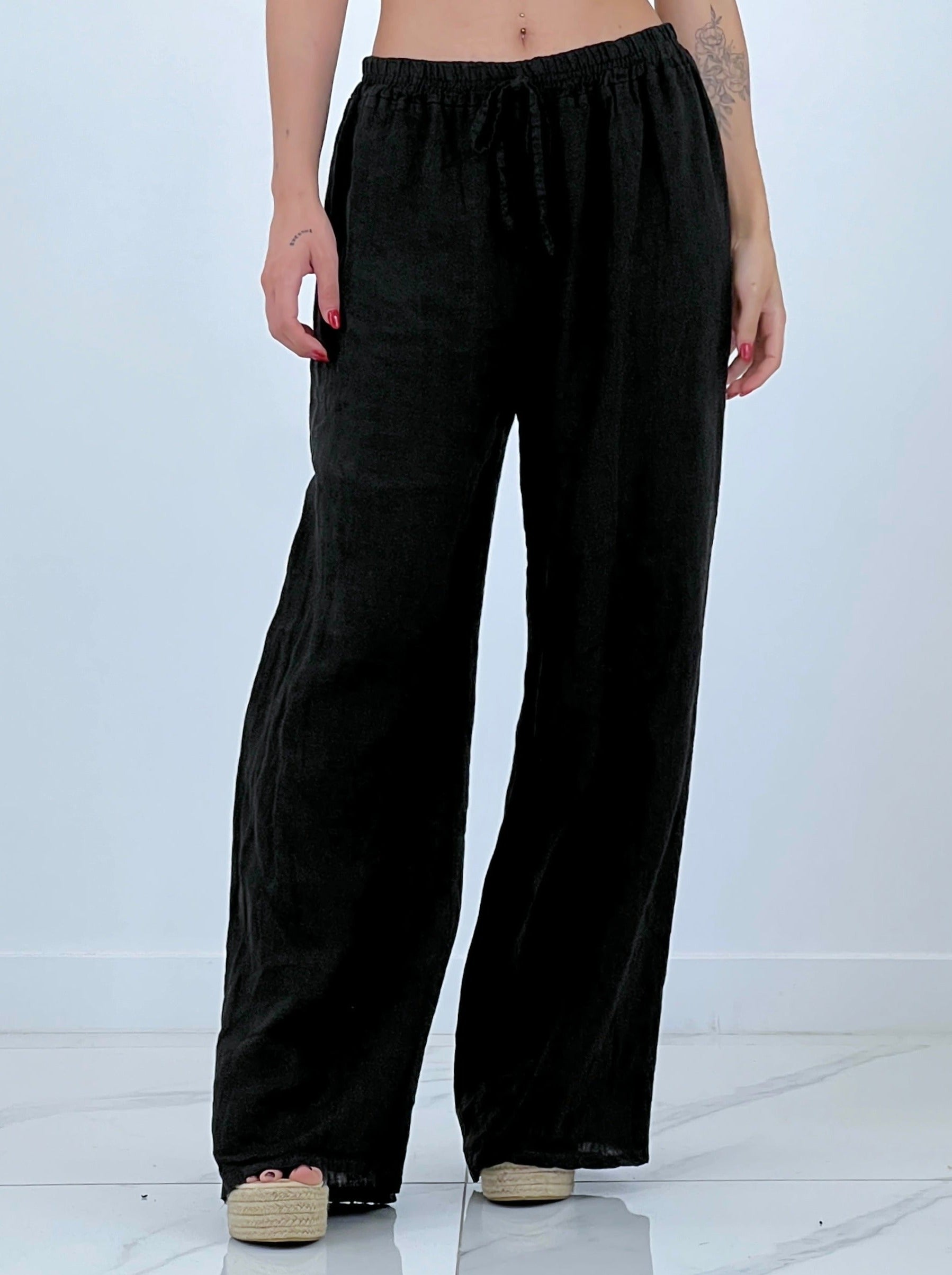 Linen flared trousers with elastic