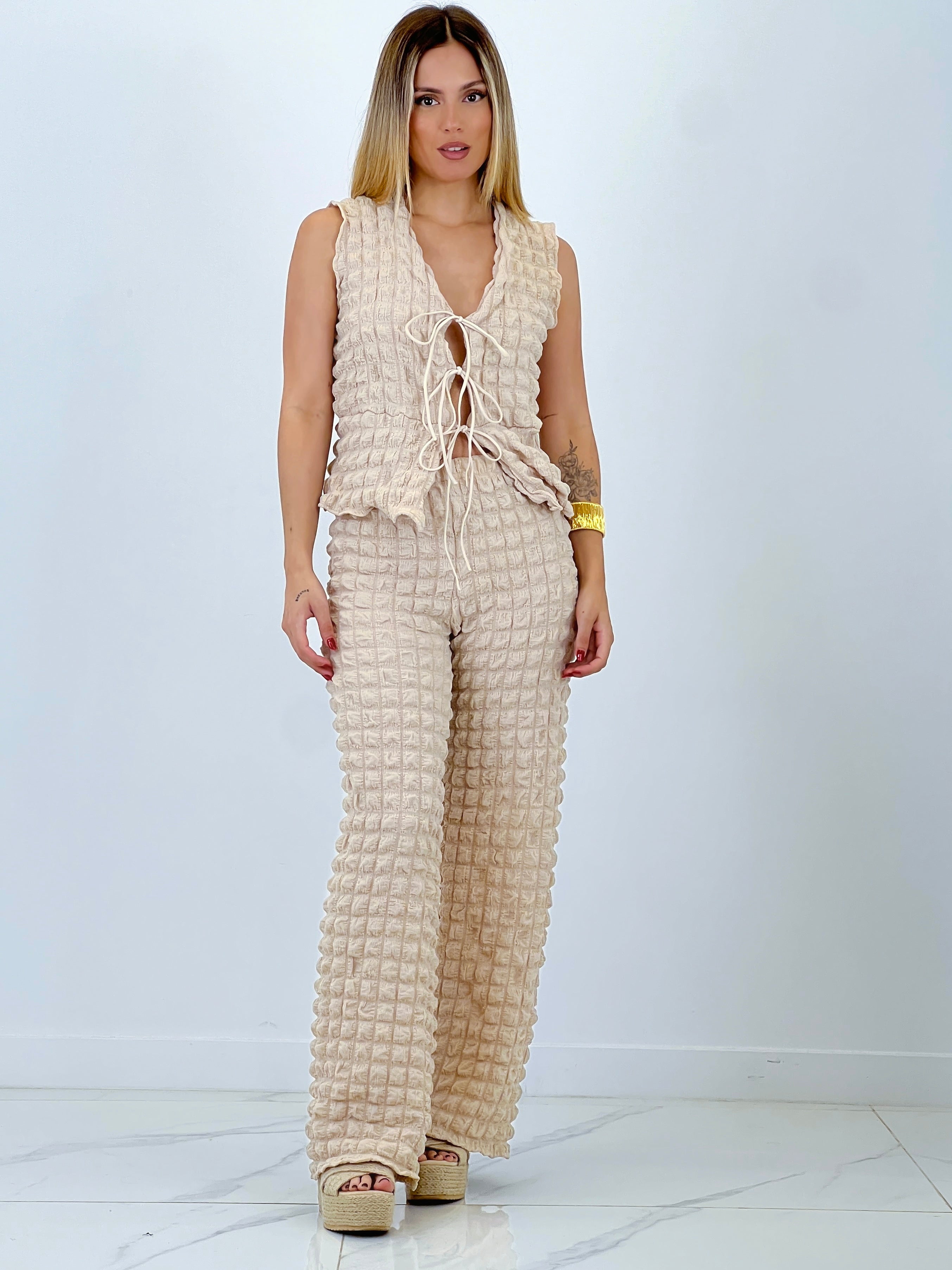 Conjunto chaleco pantalón flare