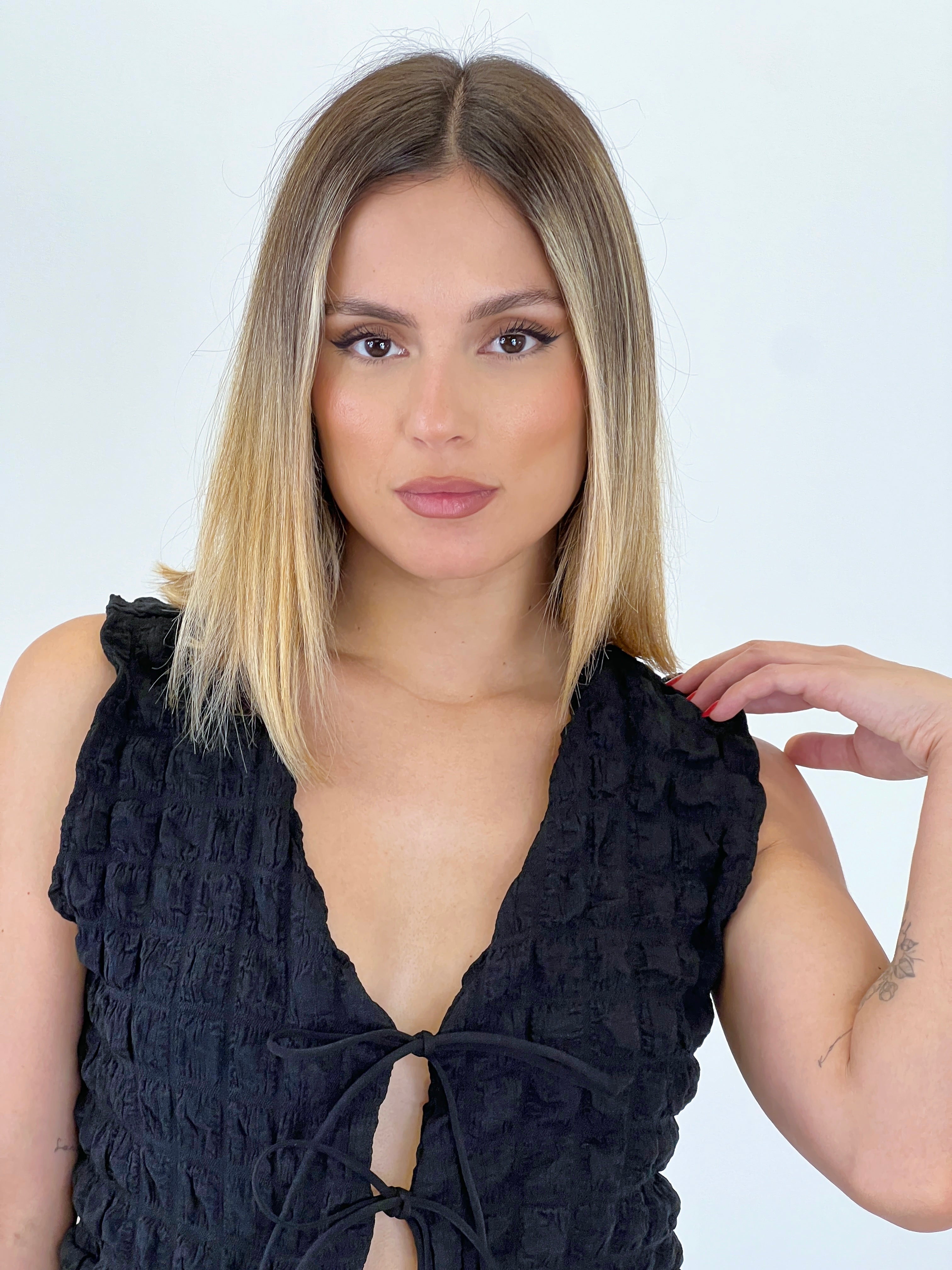 Conjunto chaleco pantalón flare