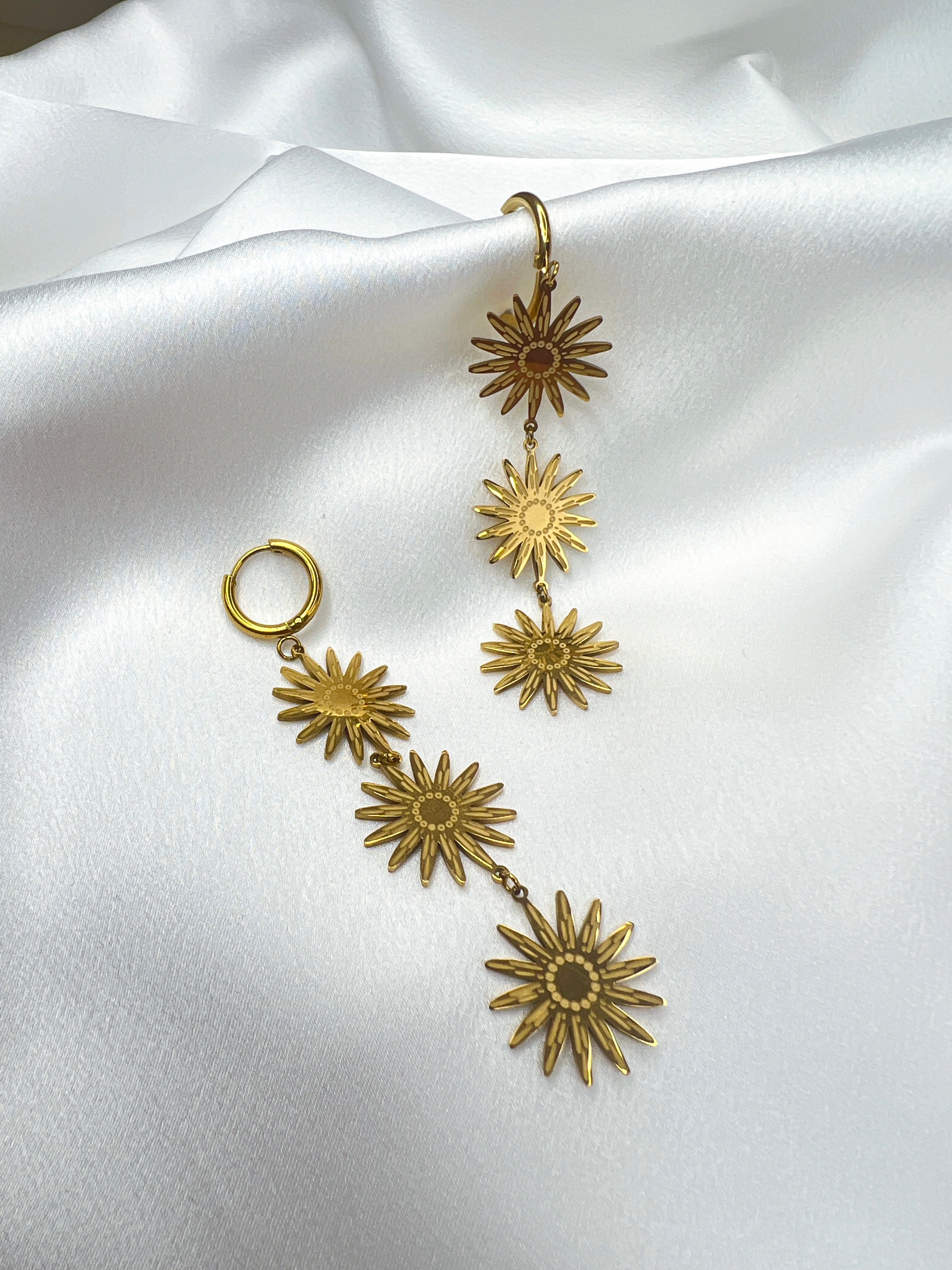 Boucle d'oreille pendante 3 soleils