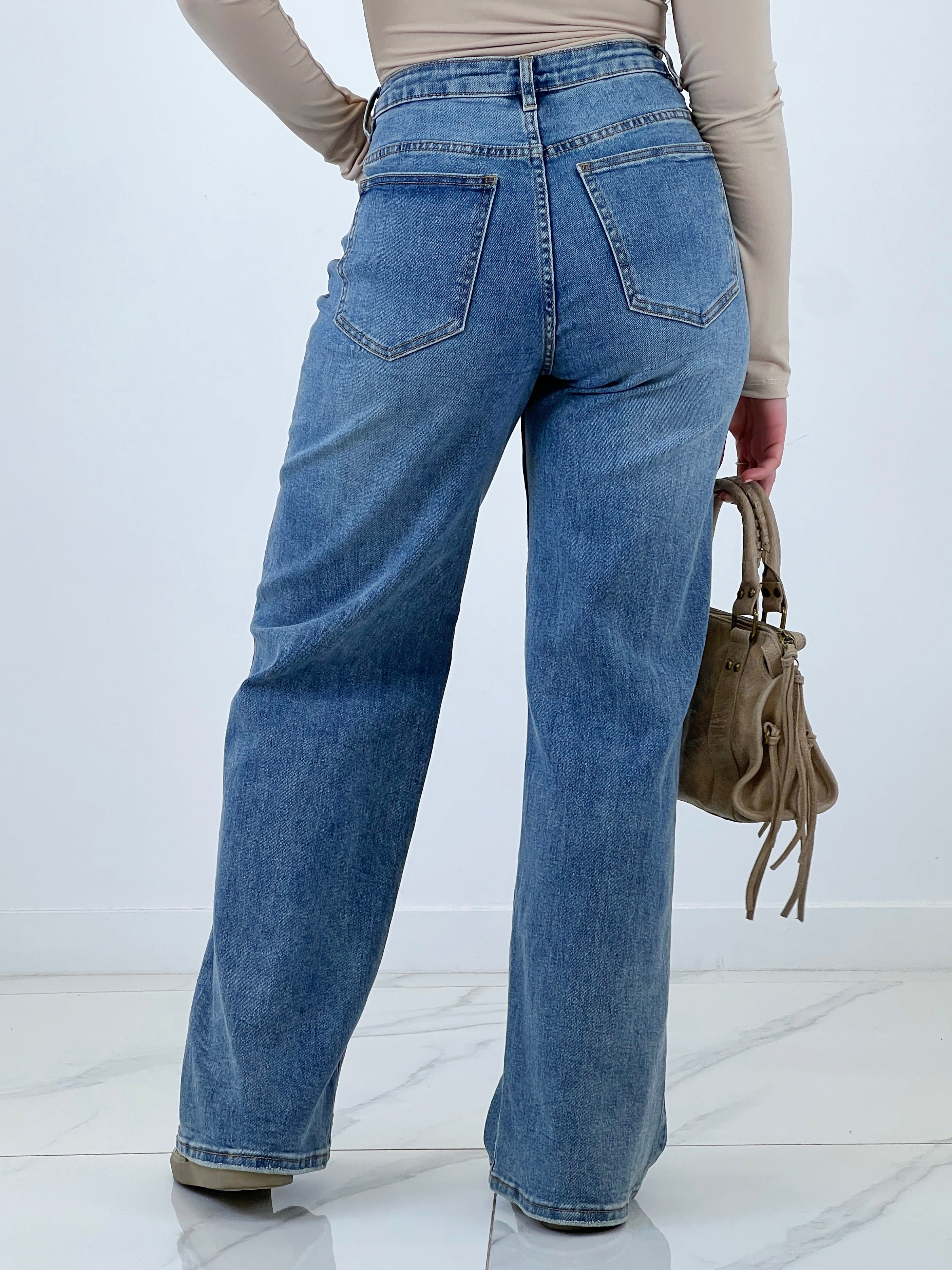 Jeans wide leg cintura cruzada