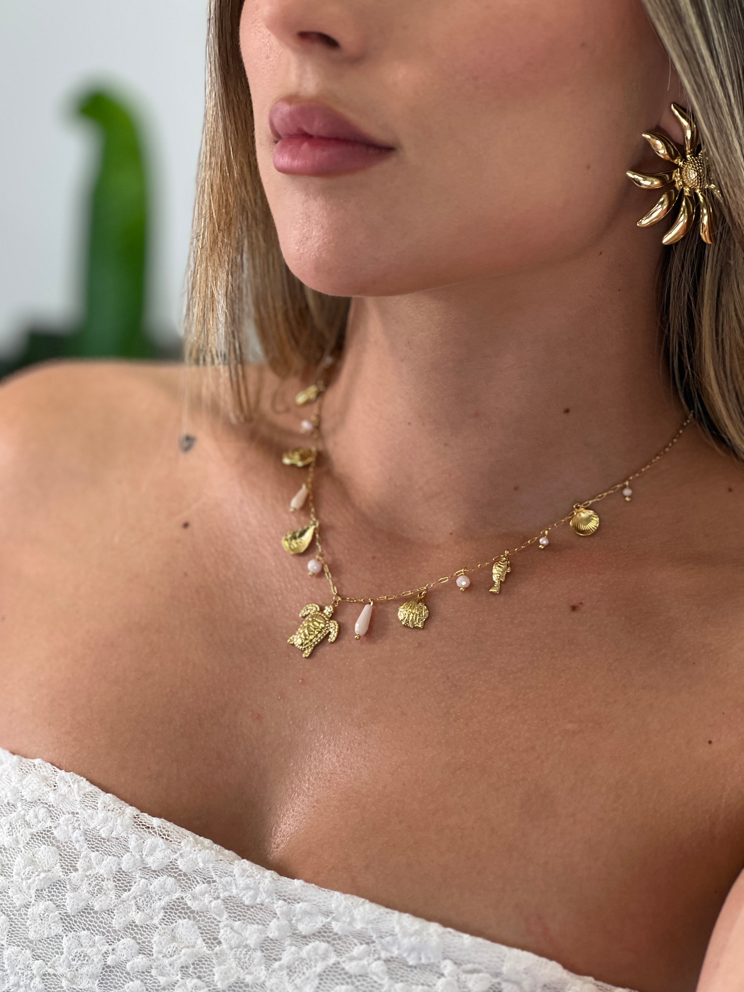 Necklace with dangling beads