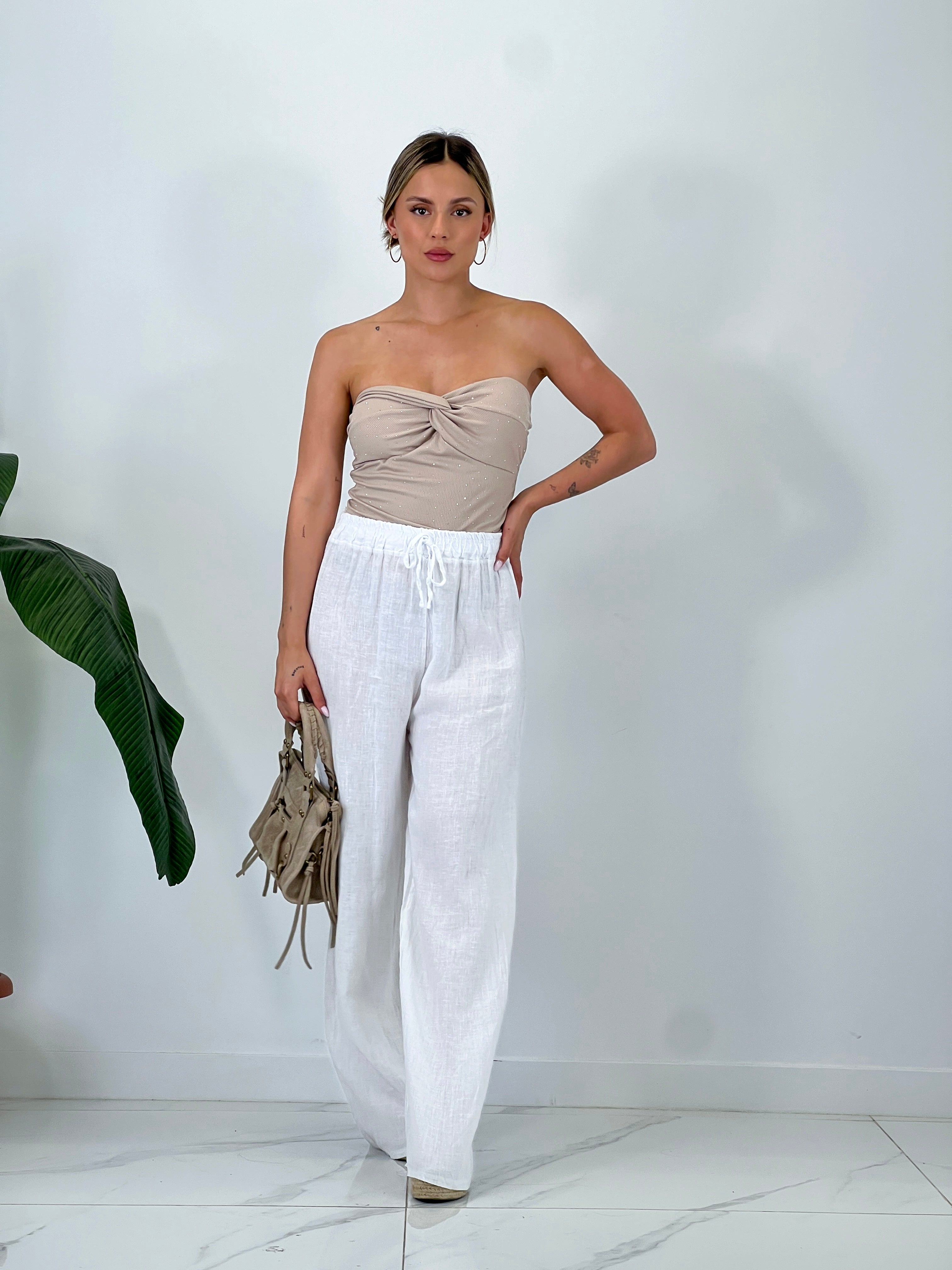 Linen flared trousers with elastic
