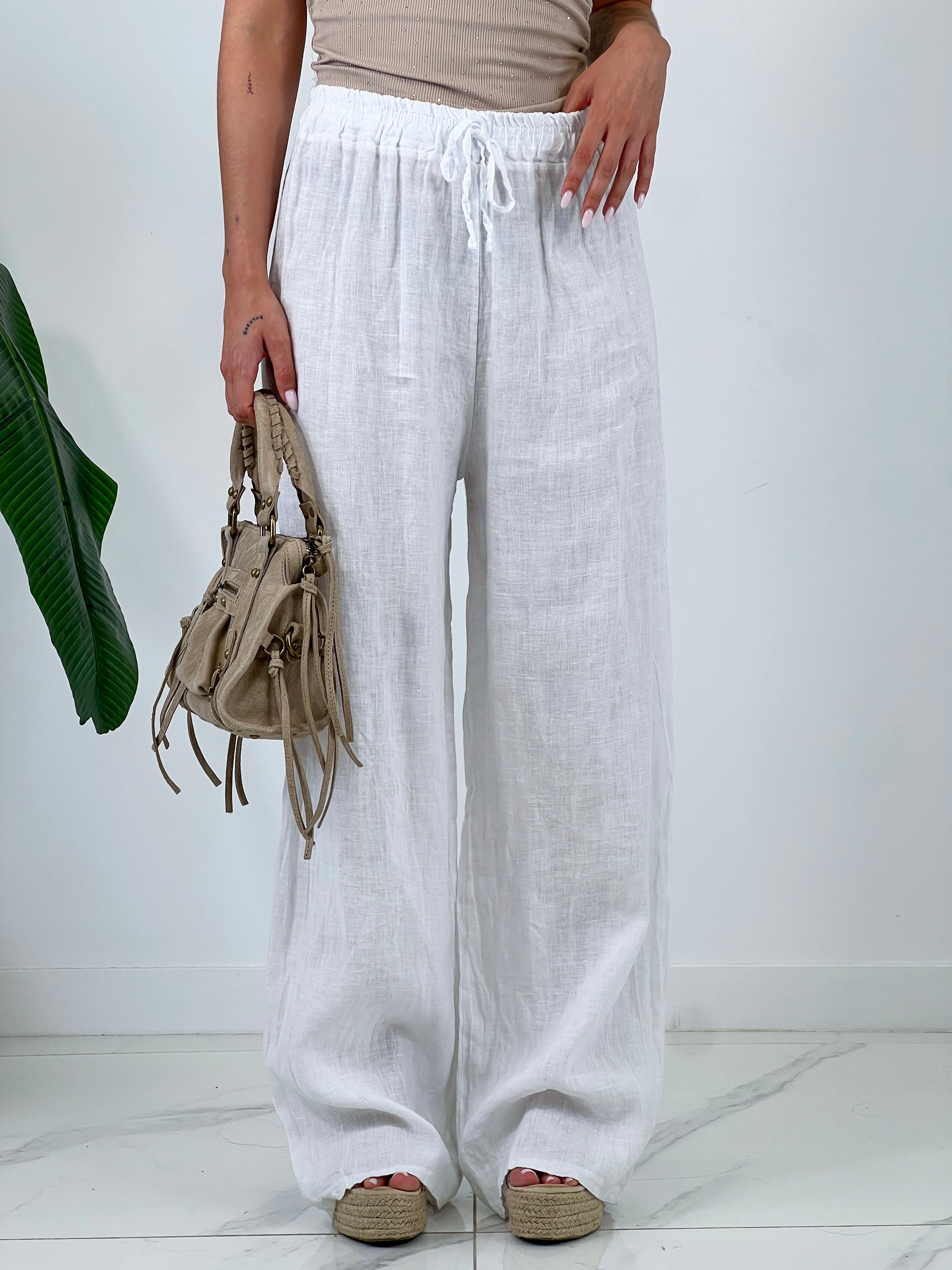 Linen flared trousers with elastic