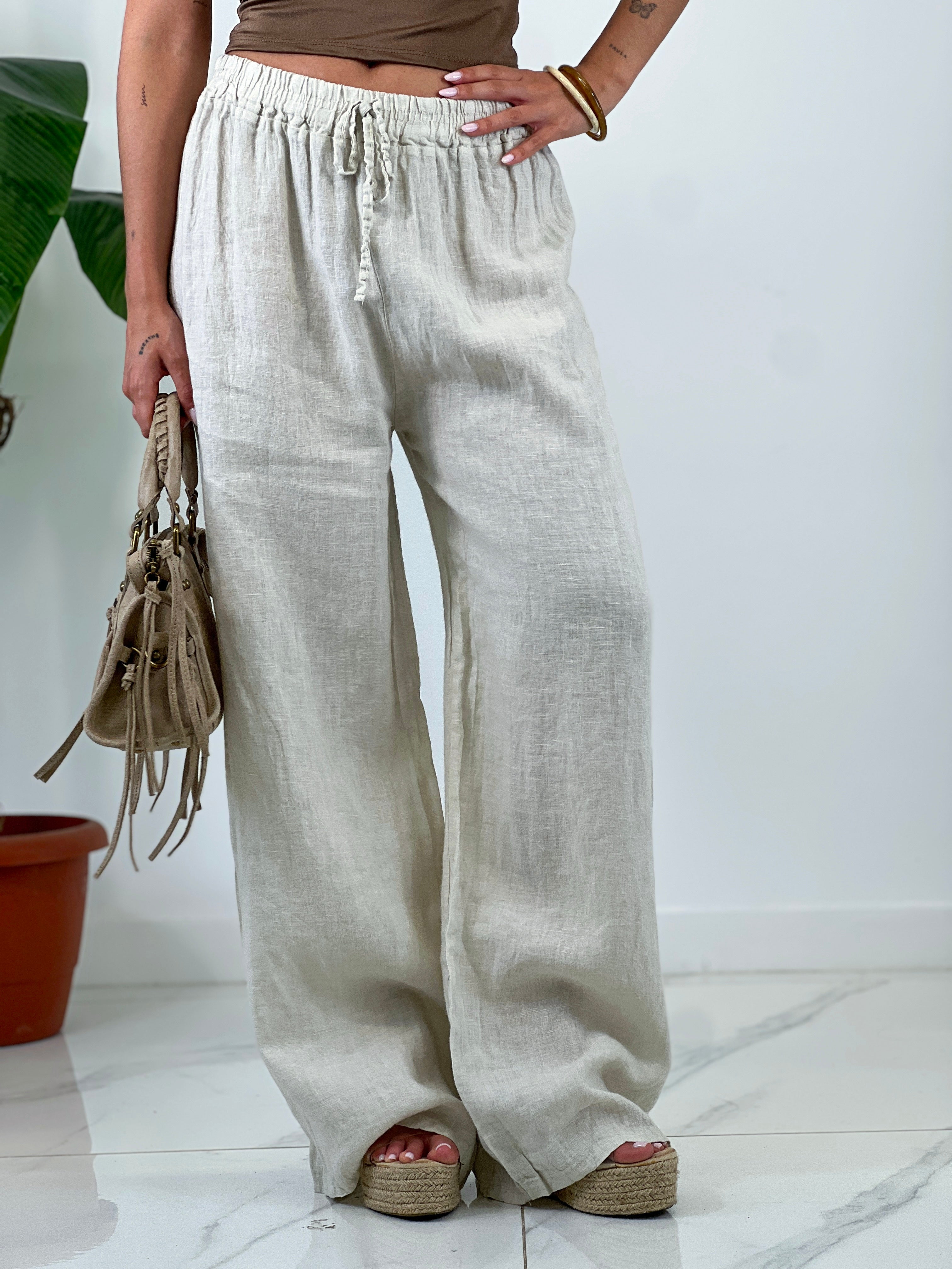 Linen flared trousers with elastic