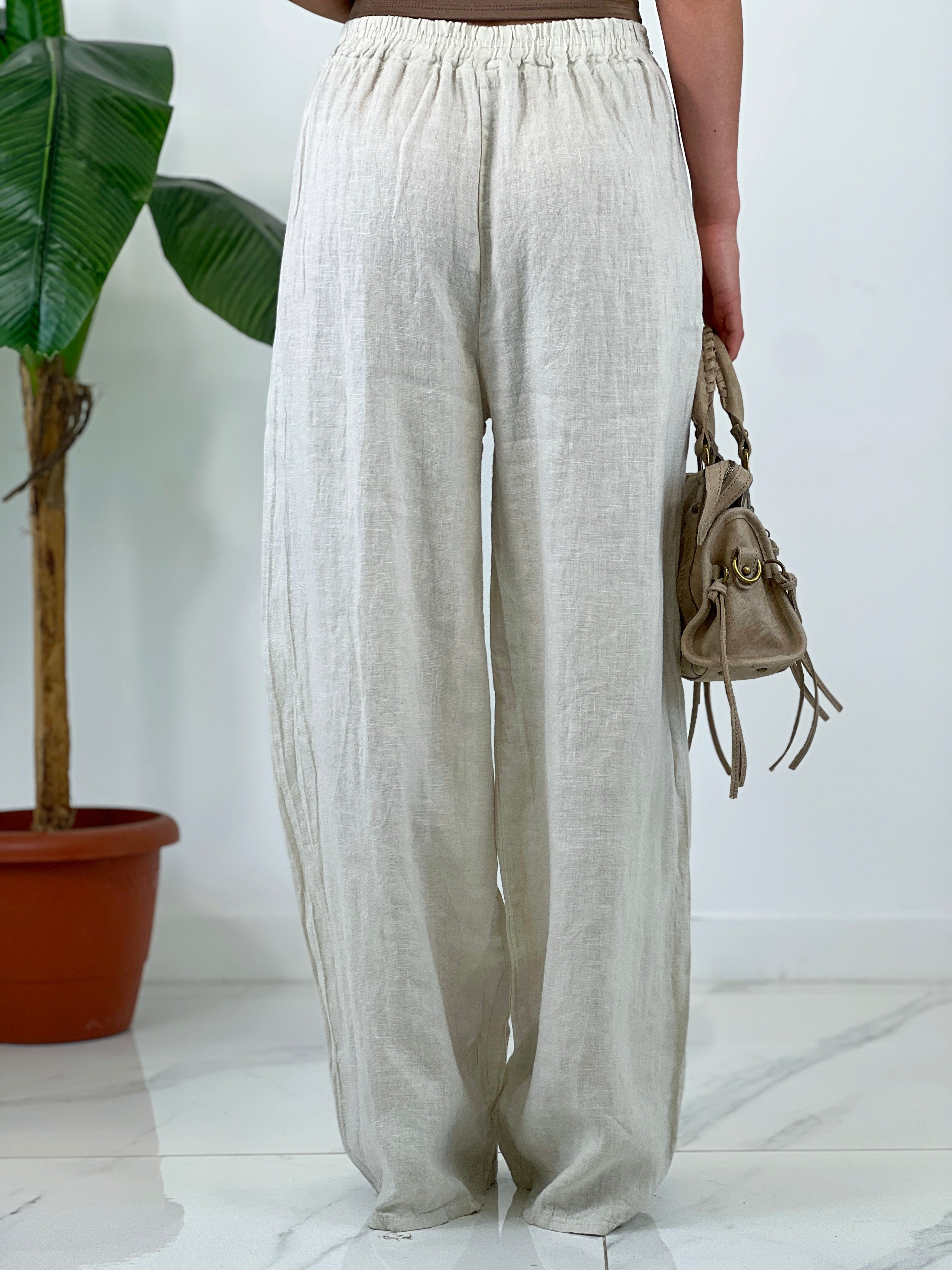 Linen flared trousers with elastic