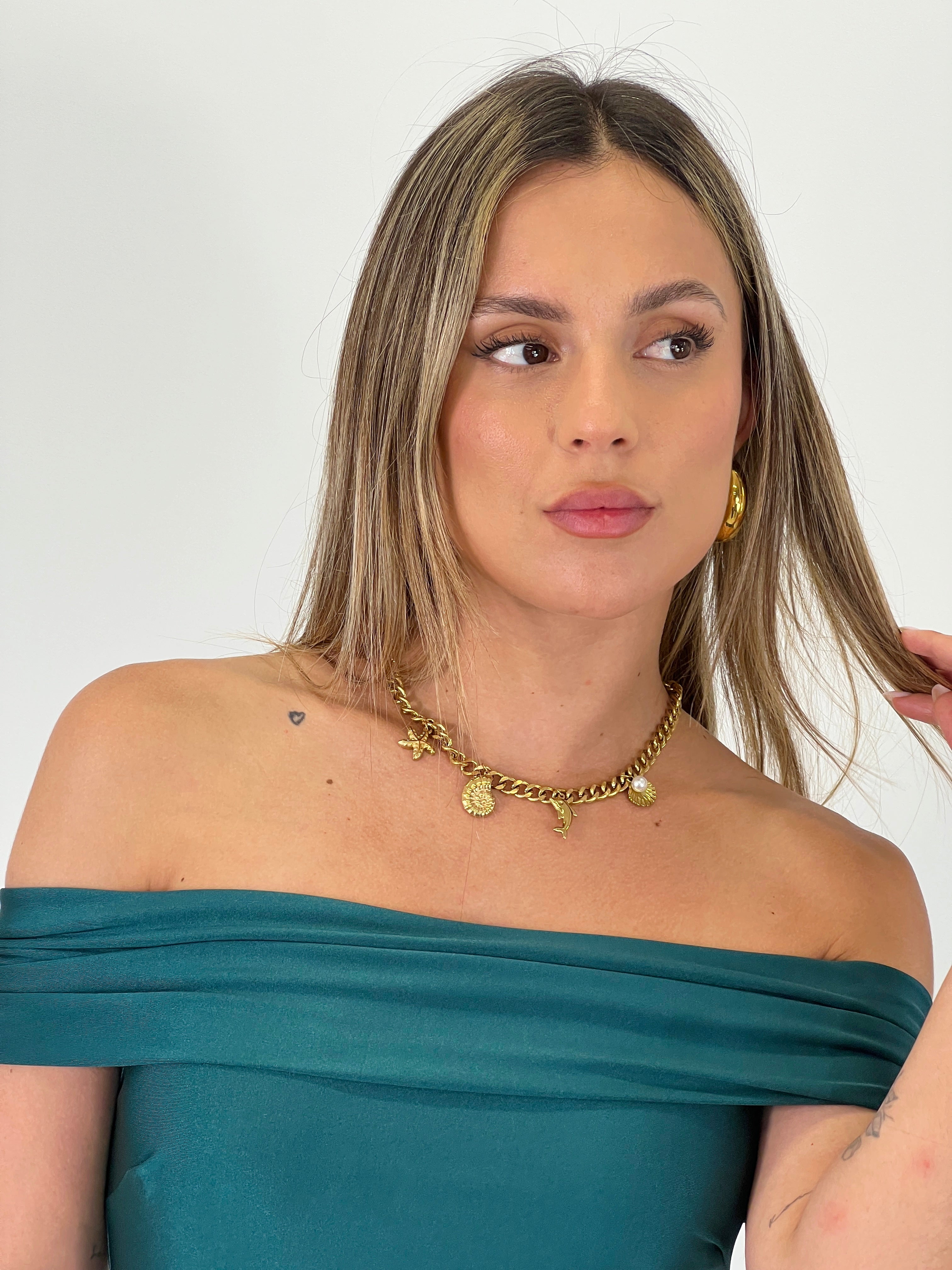 Necklace with dangling beads