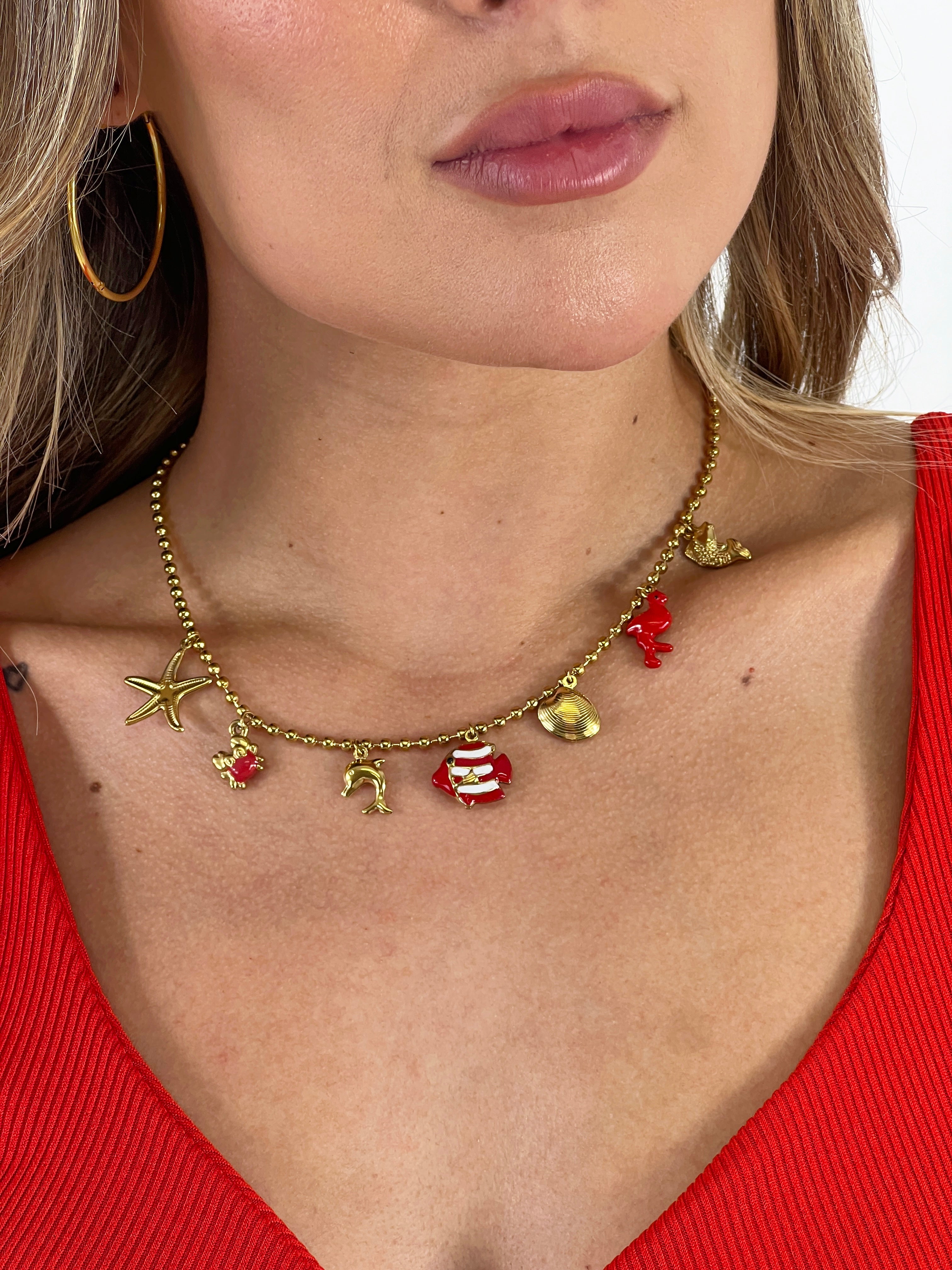 Necklace with dangling beads