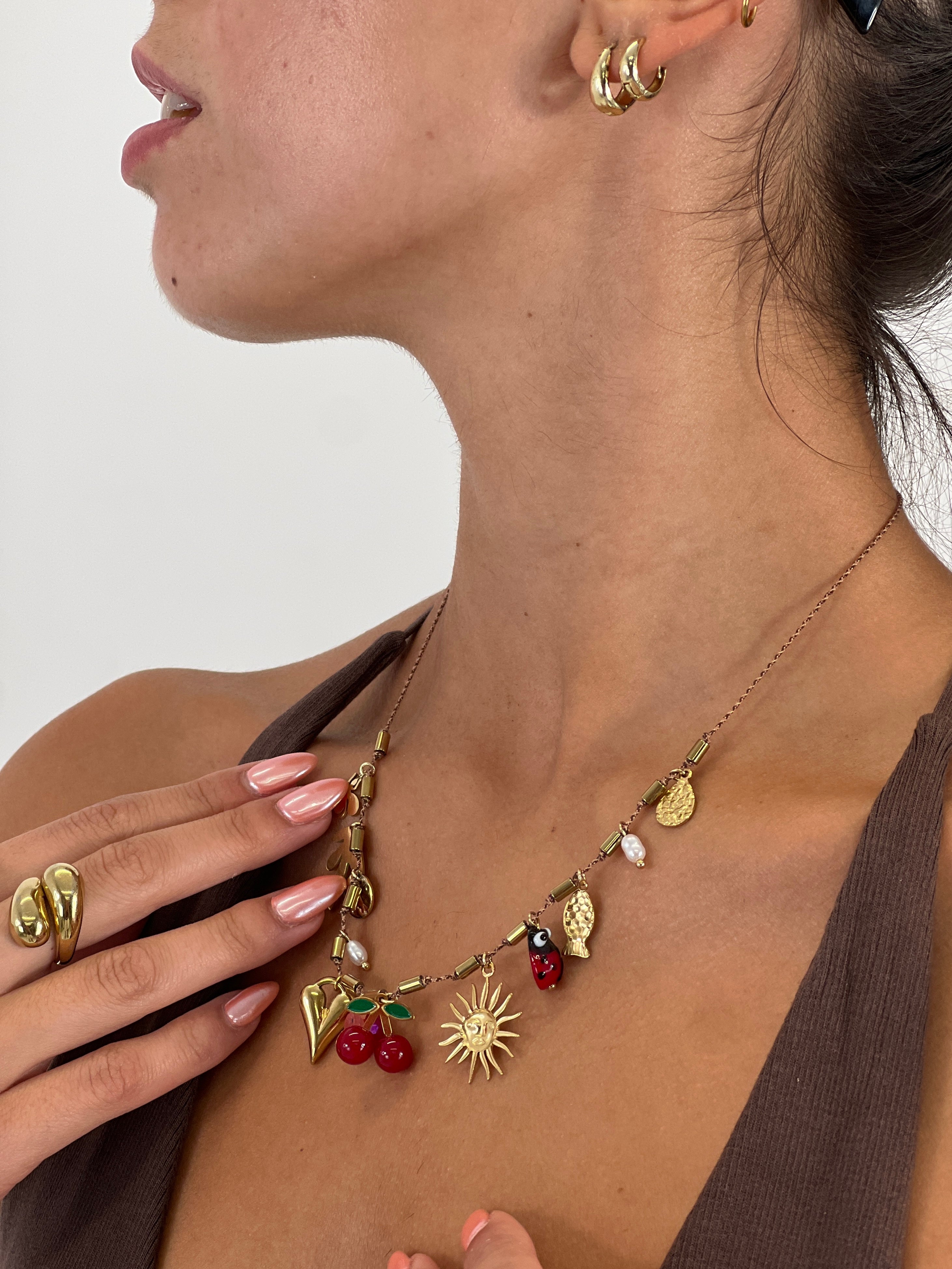 Necklace with dangling beads