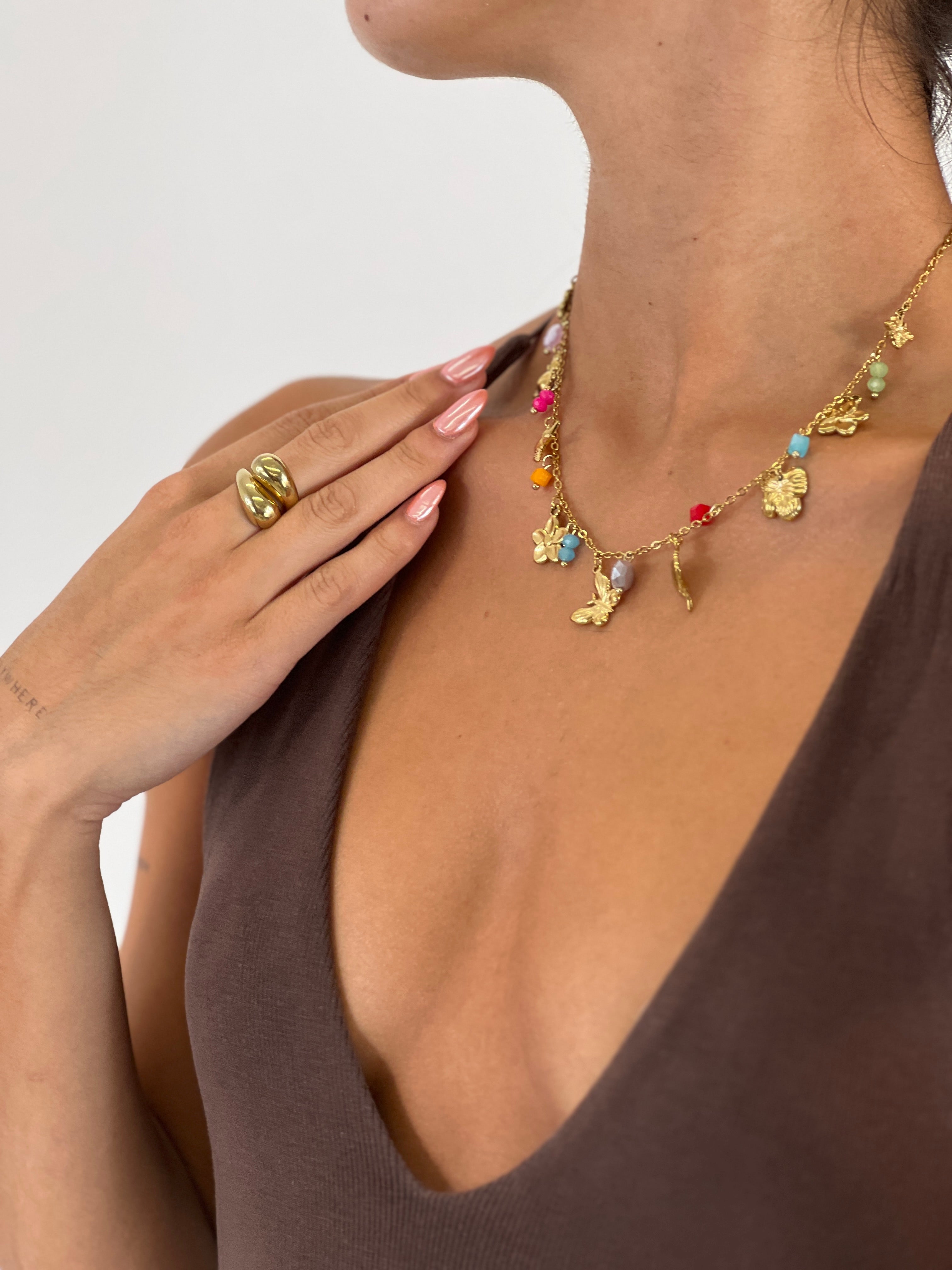 Necklace with dangling beads