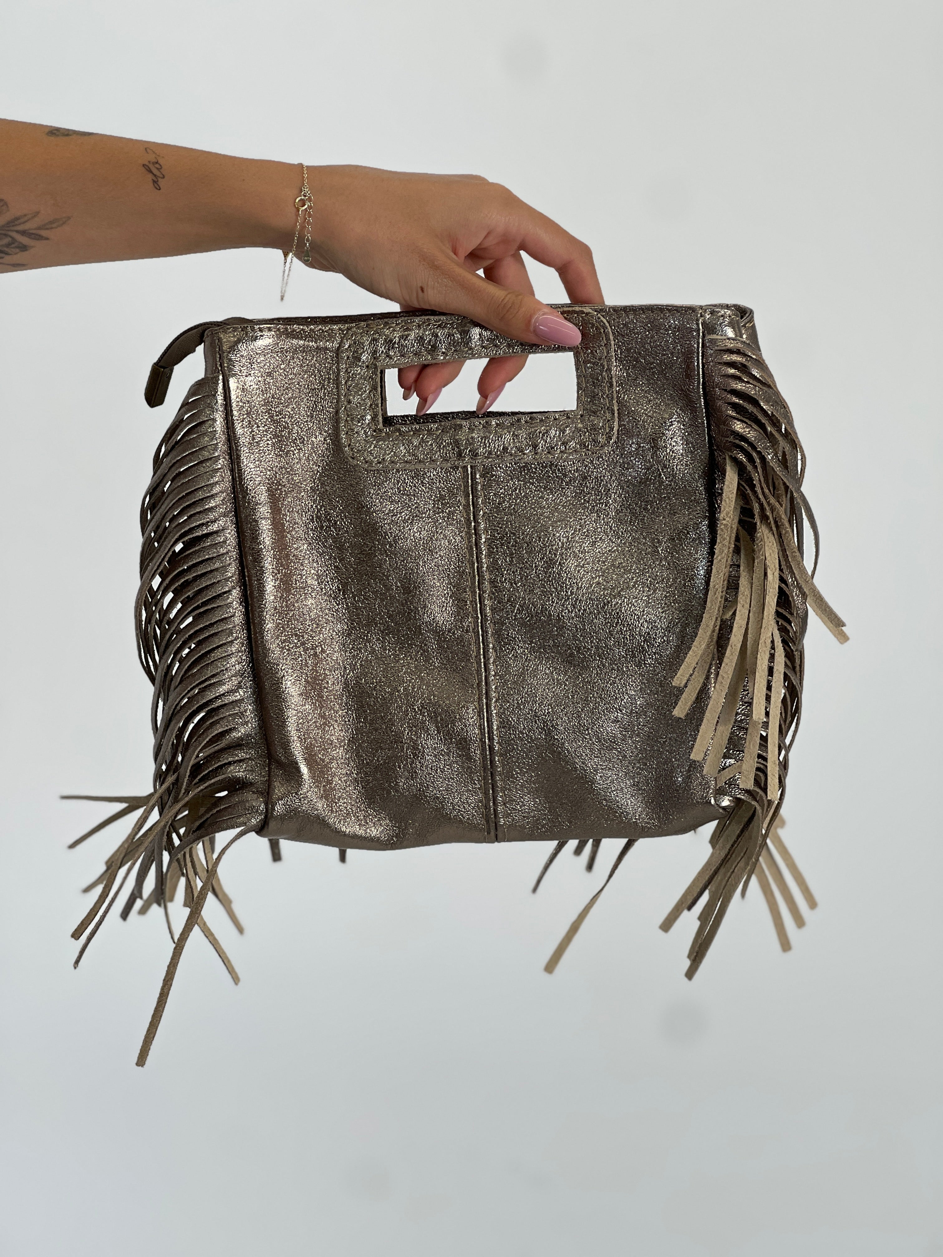 Bolso piel flecos