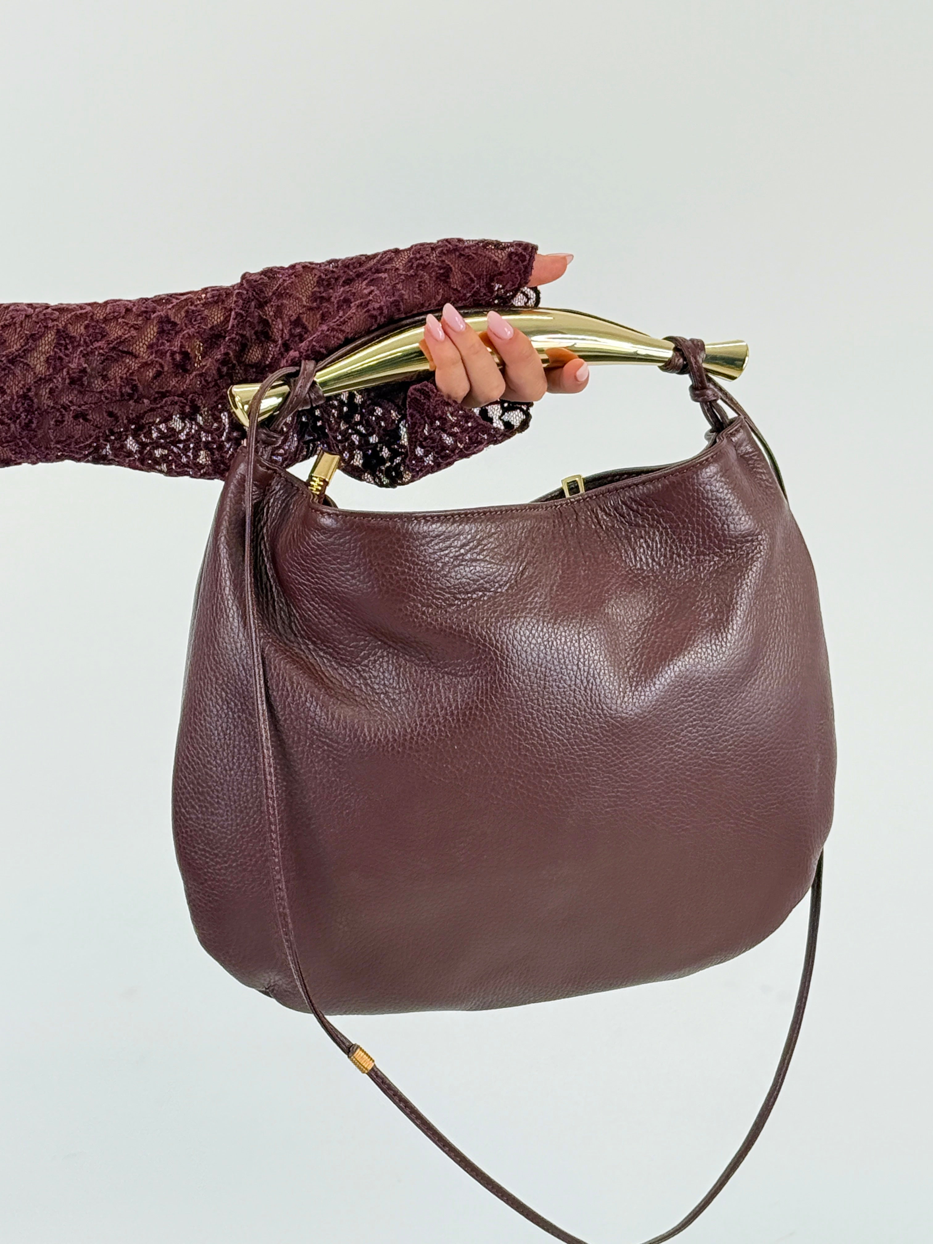 Bolso piel detalle metal