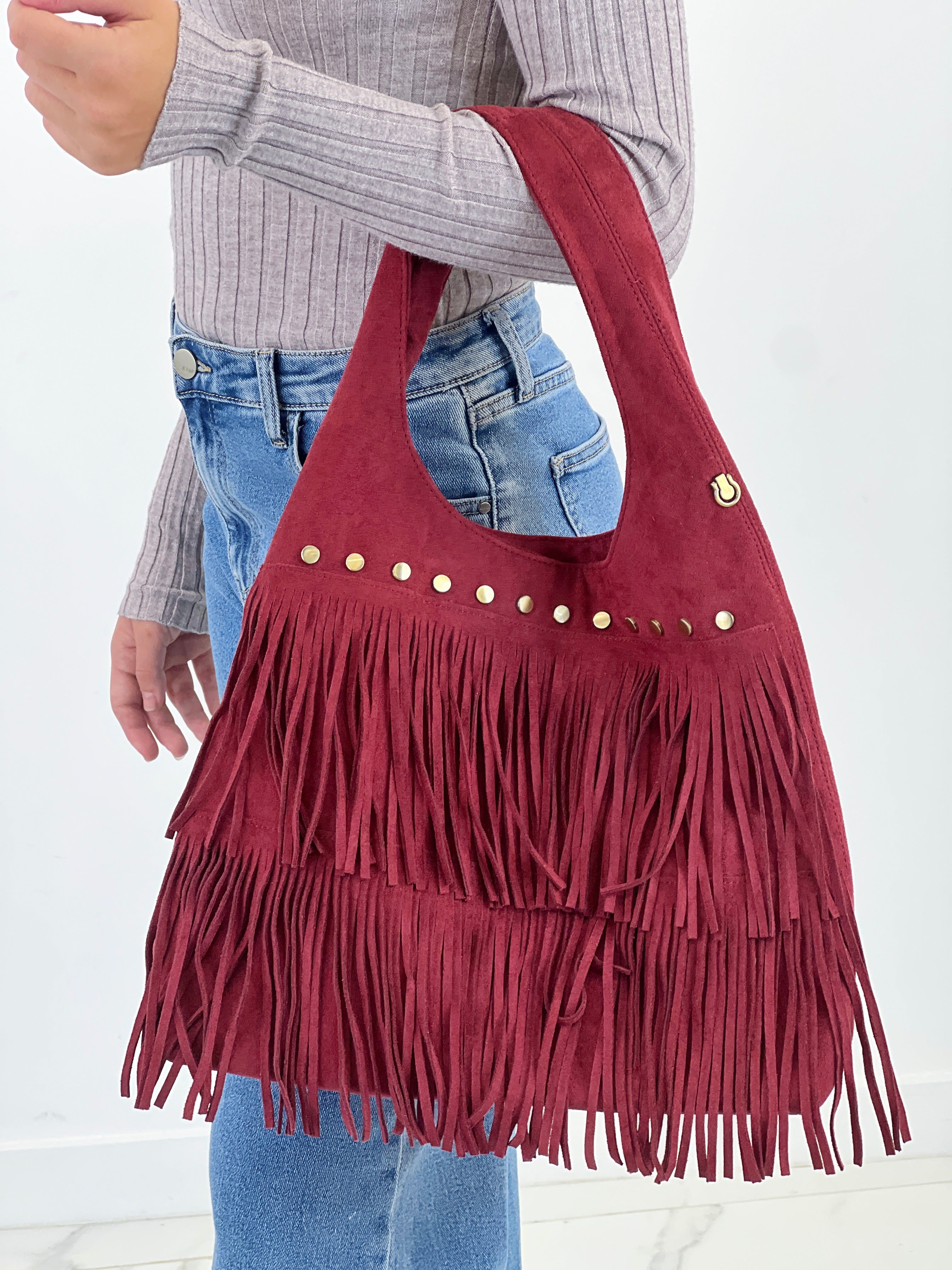 Bolso flecos tachuela