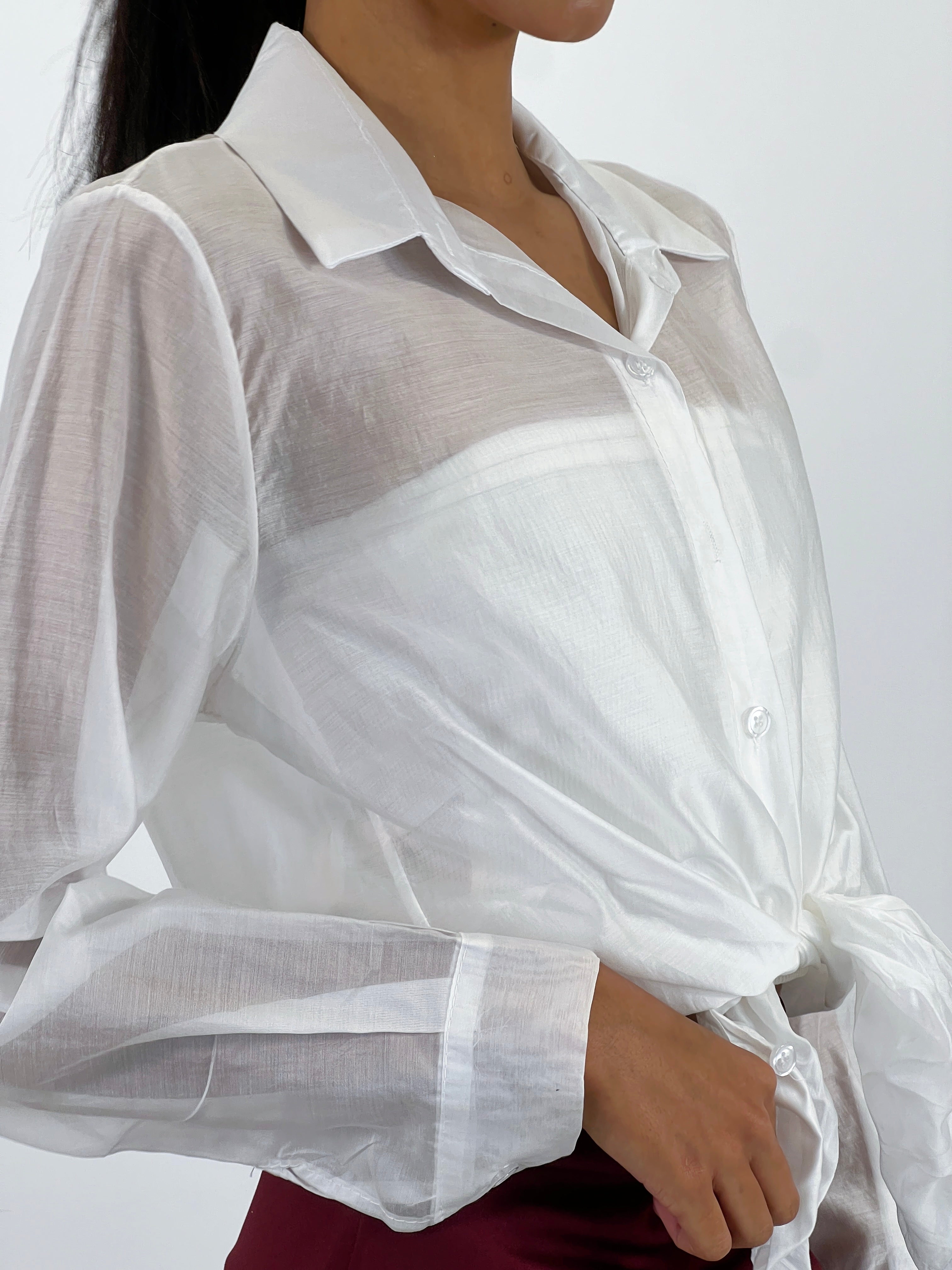 Blusa transparencia nudo
