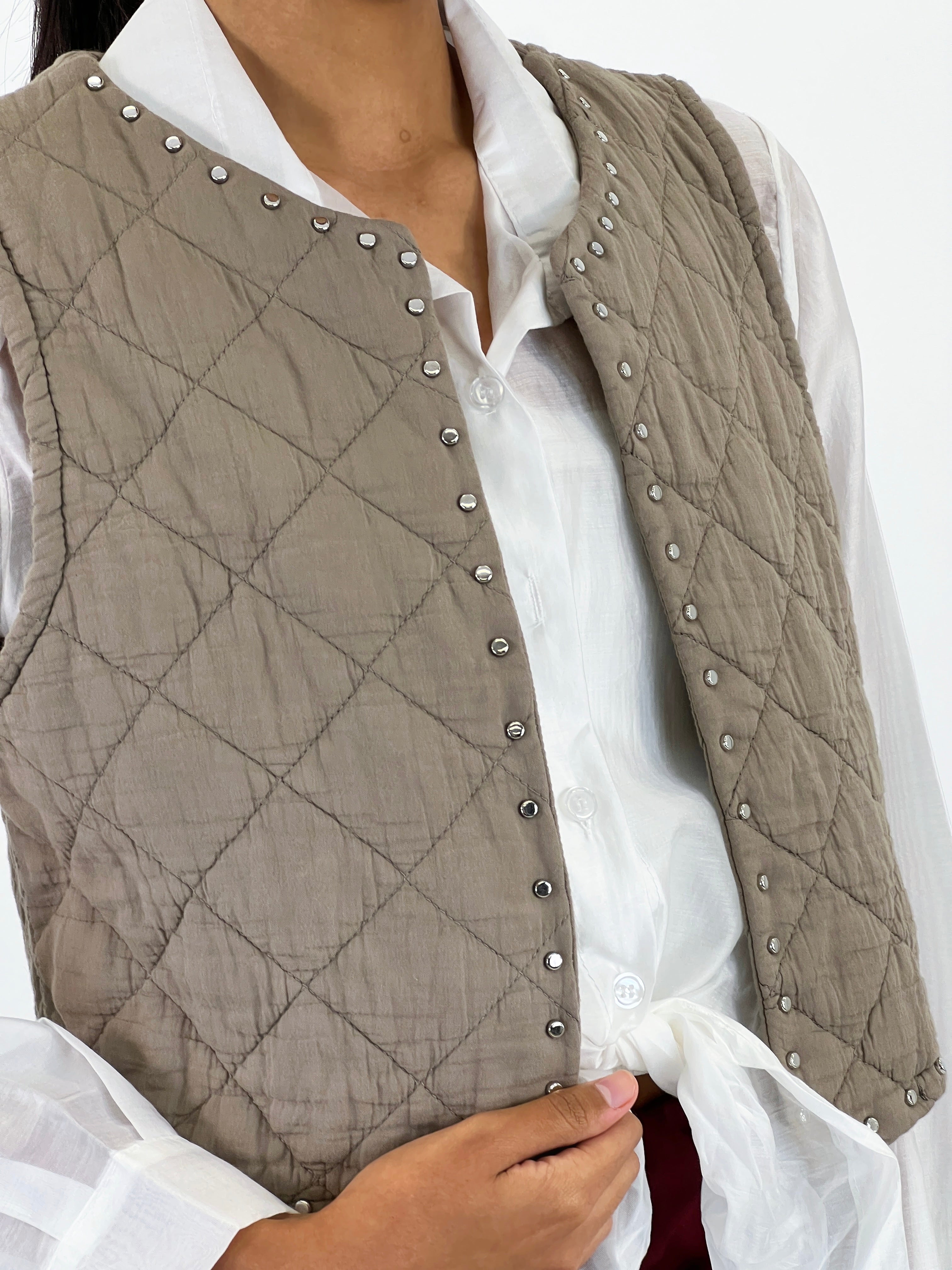 Chaleco padding tachas