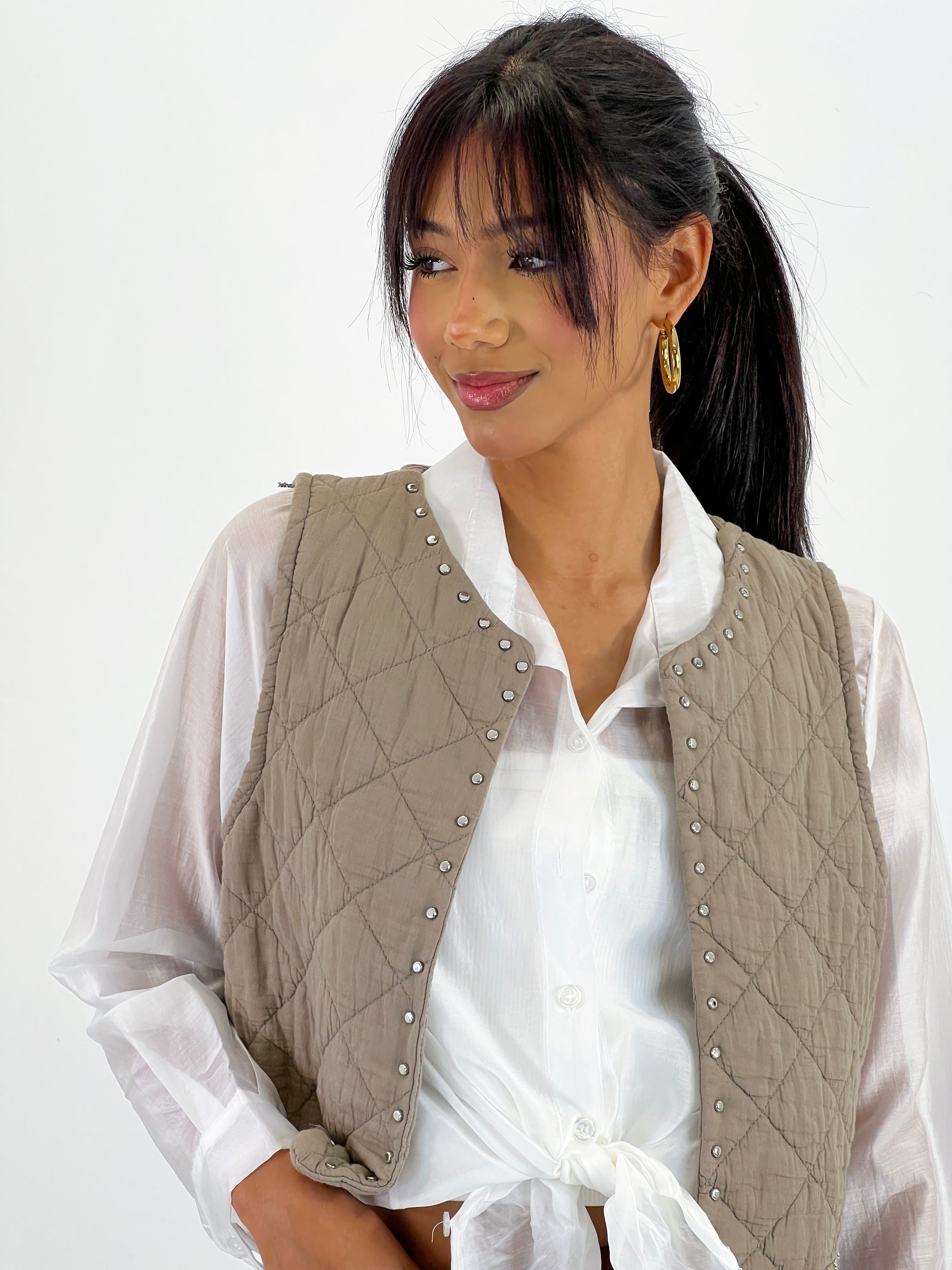 Chaleco padding tachas