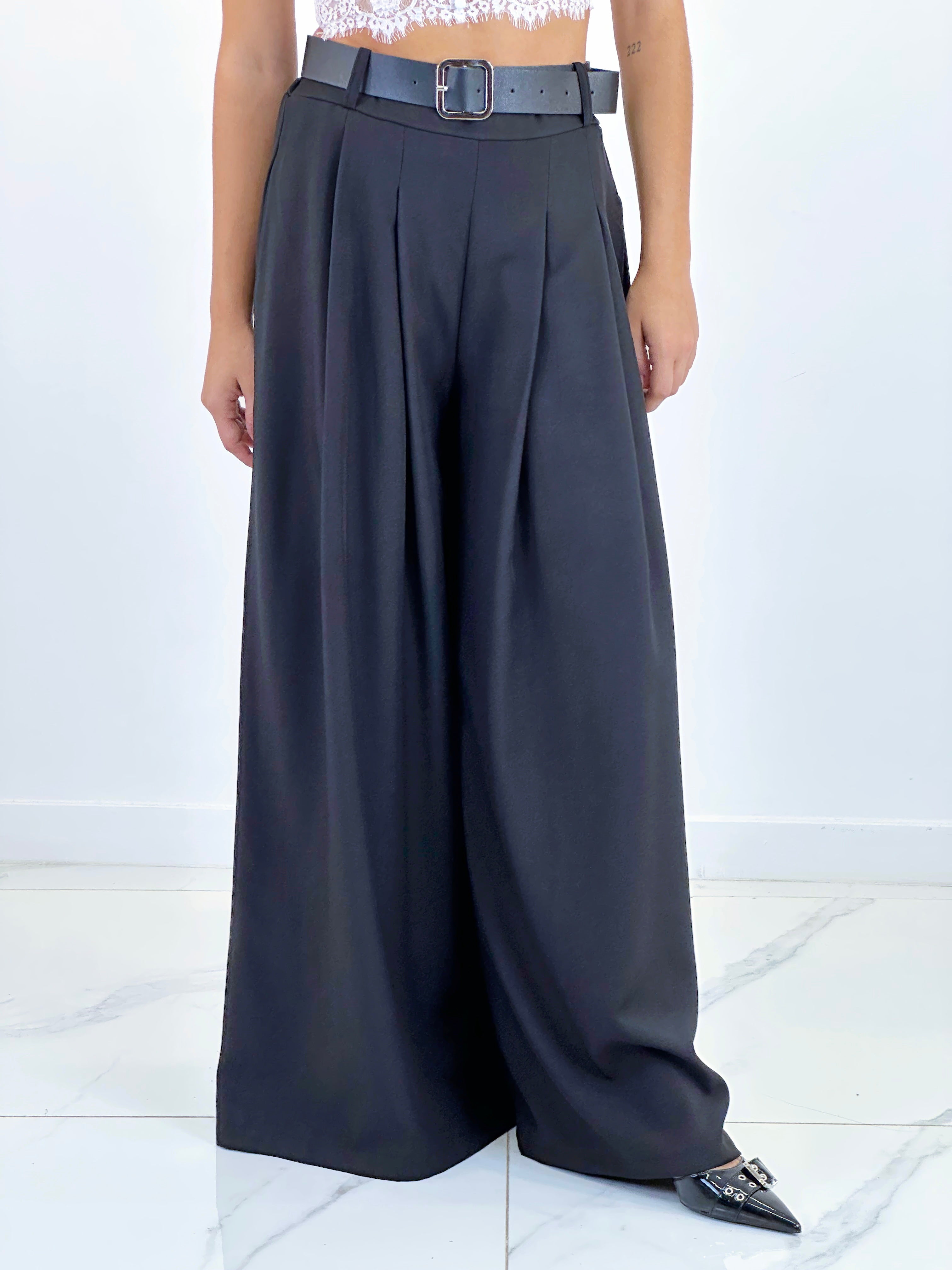 Pantalón pinzas suelto